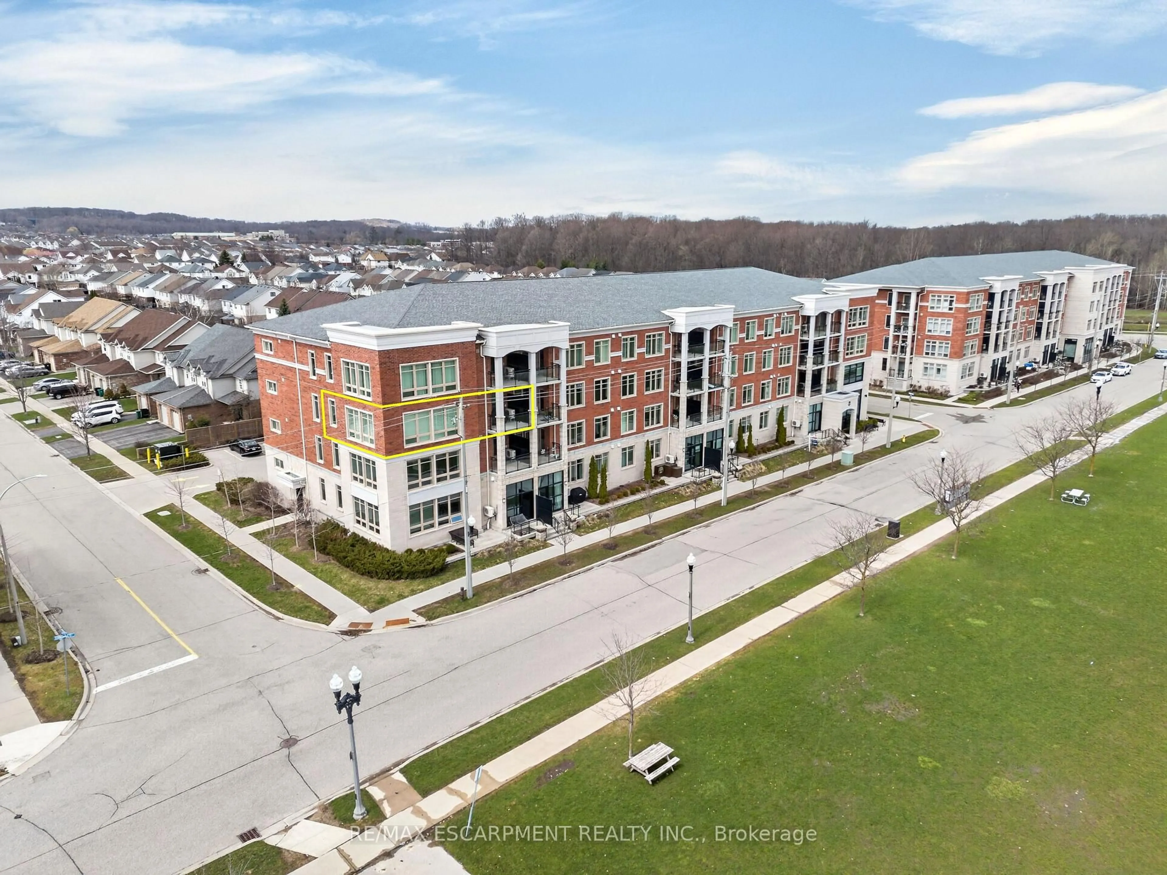 A pic from outside/outdoor area/front of a property/back of a property/a pic from drone, unknown for 175 Commonwealth St #202, Kitchener Ontario N2E 0H4