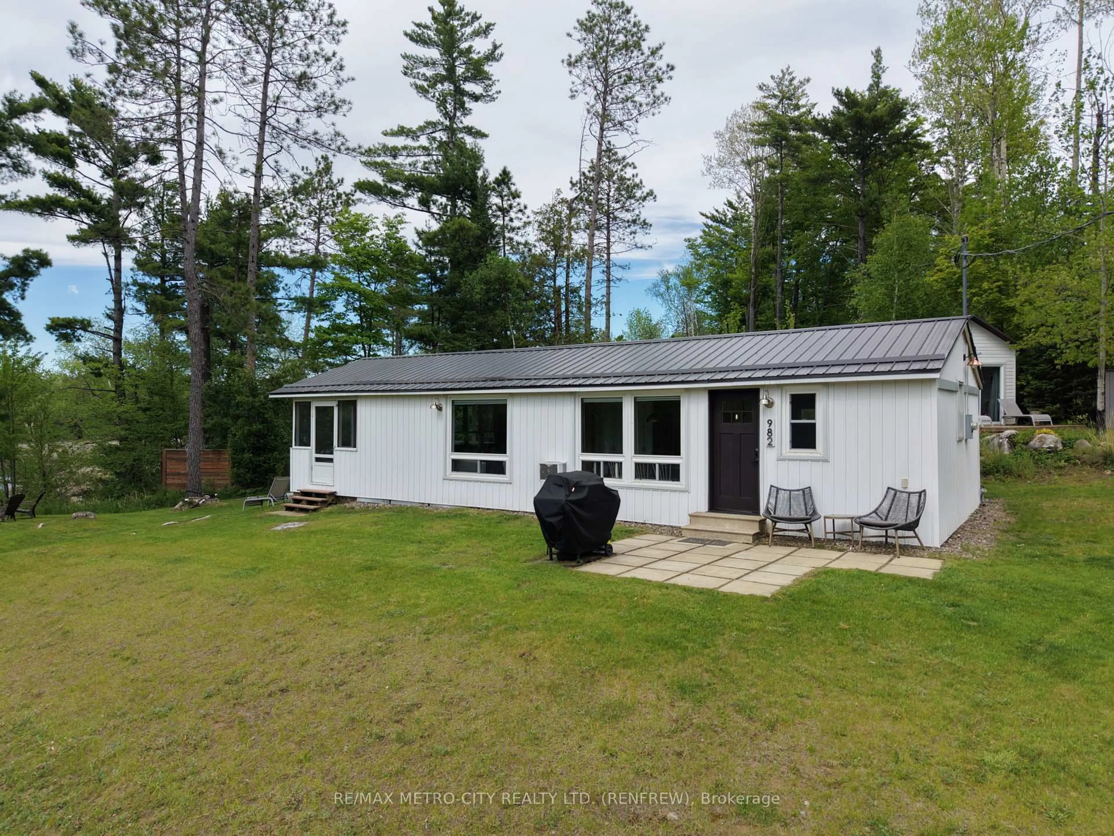 A pic from outside/outdoor area/front of a property/back of a property/a pic from drone, forest/trees view for 982 STONES LAKE Rd, Calabogie Ontario K0J 1H0