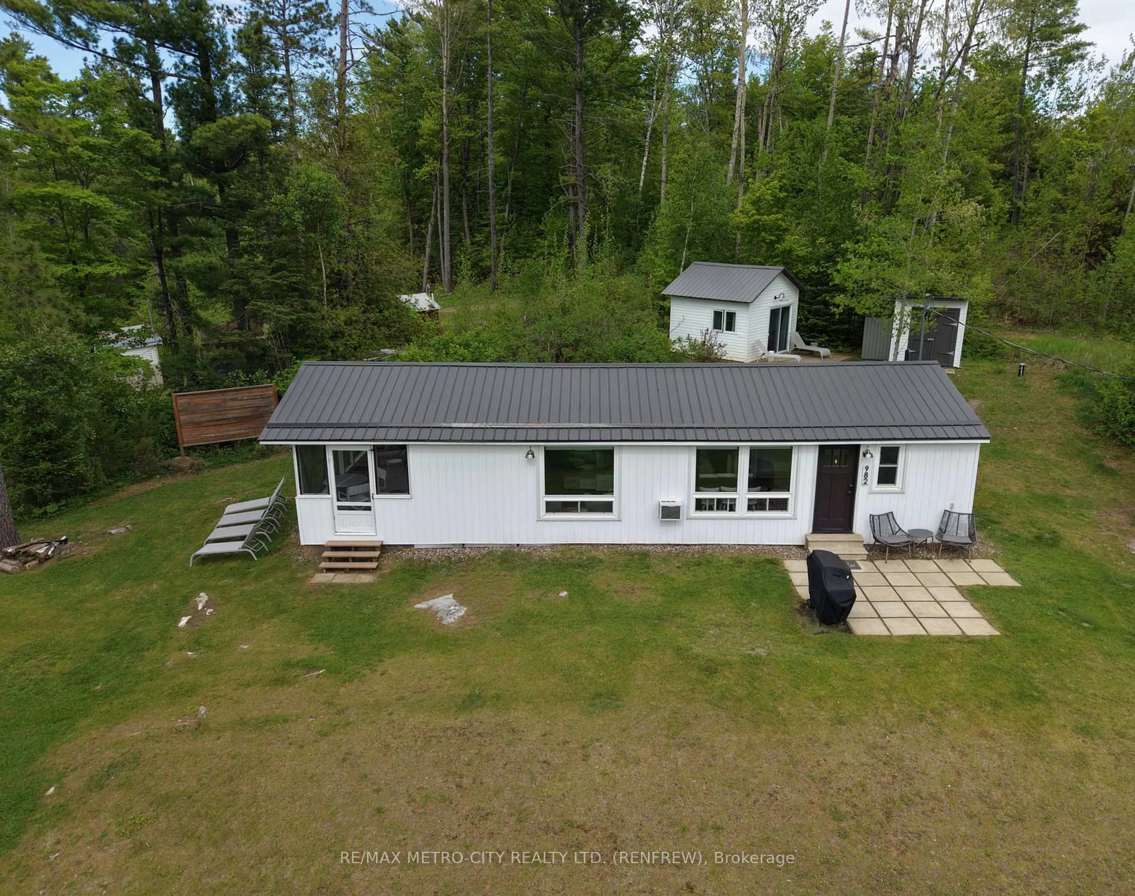 A pic from outside/outdoor area/front of a property/back of a property/a pic from drone, water/lake/river/ocean view for 982 STONES LAKE Rd, Calabogie Ontario K0J 1H0