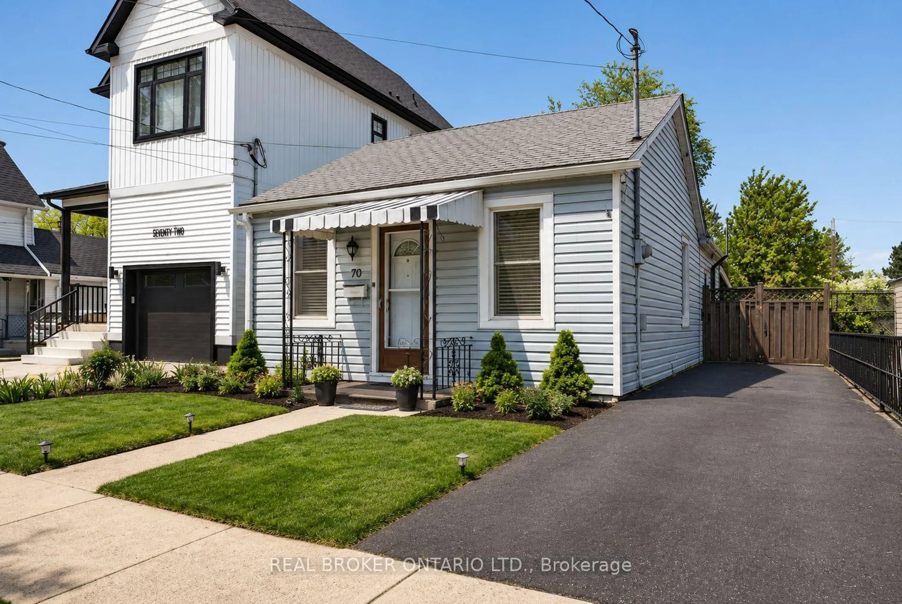 Home with vinyl exterior material, street for 70 Poulette St, Hamilton Ontario L8P 4E2