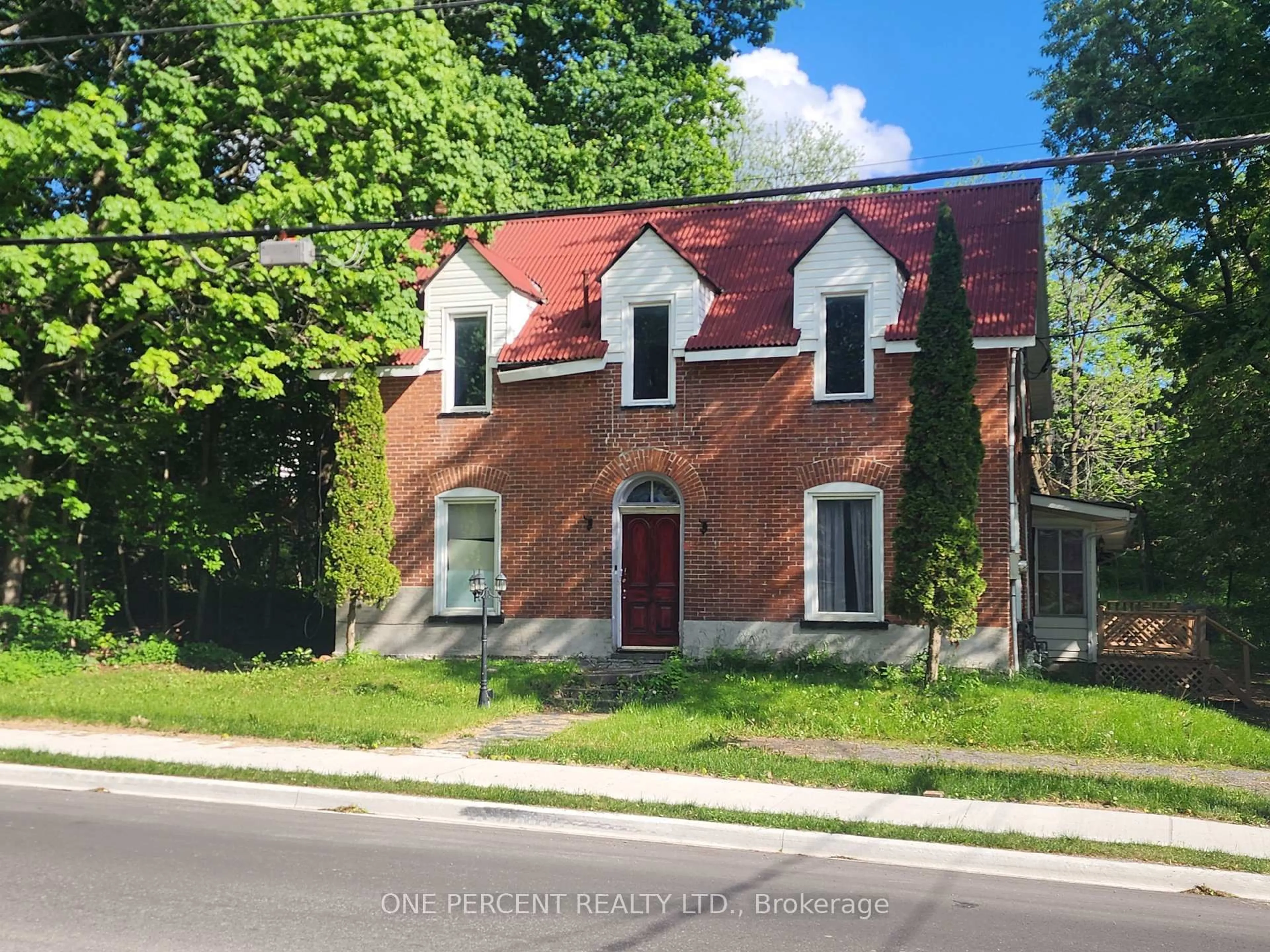 Home with brick exterior material, street for 213 St Lawrence Street East St, Madoc Ontario K0K 2K0
