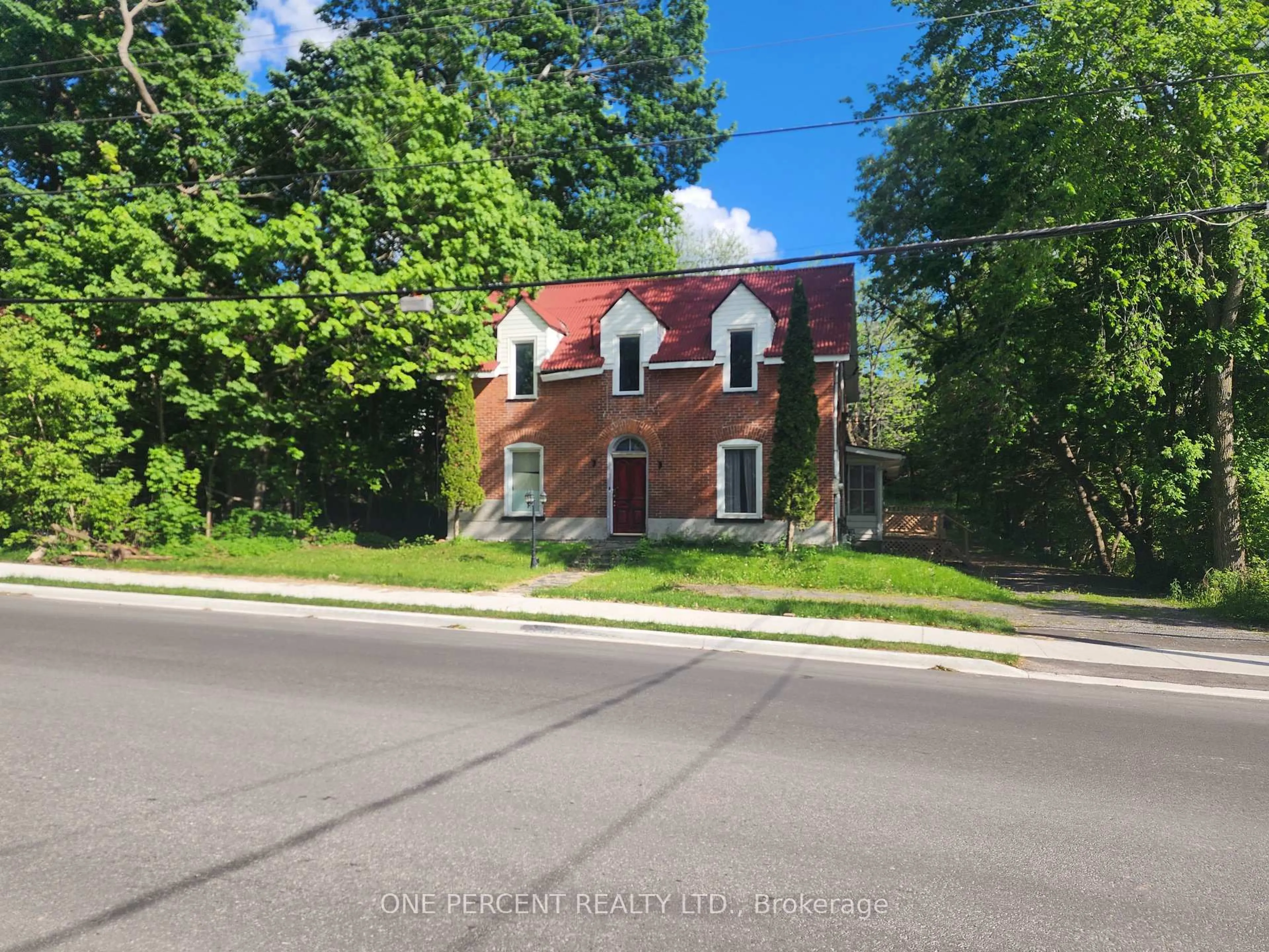 Home with brick exterior material, street for 213 St Lawrence Street East St, Madoc Ontario K0K 2K0