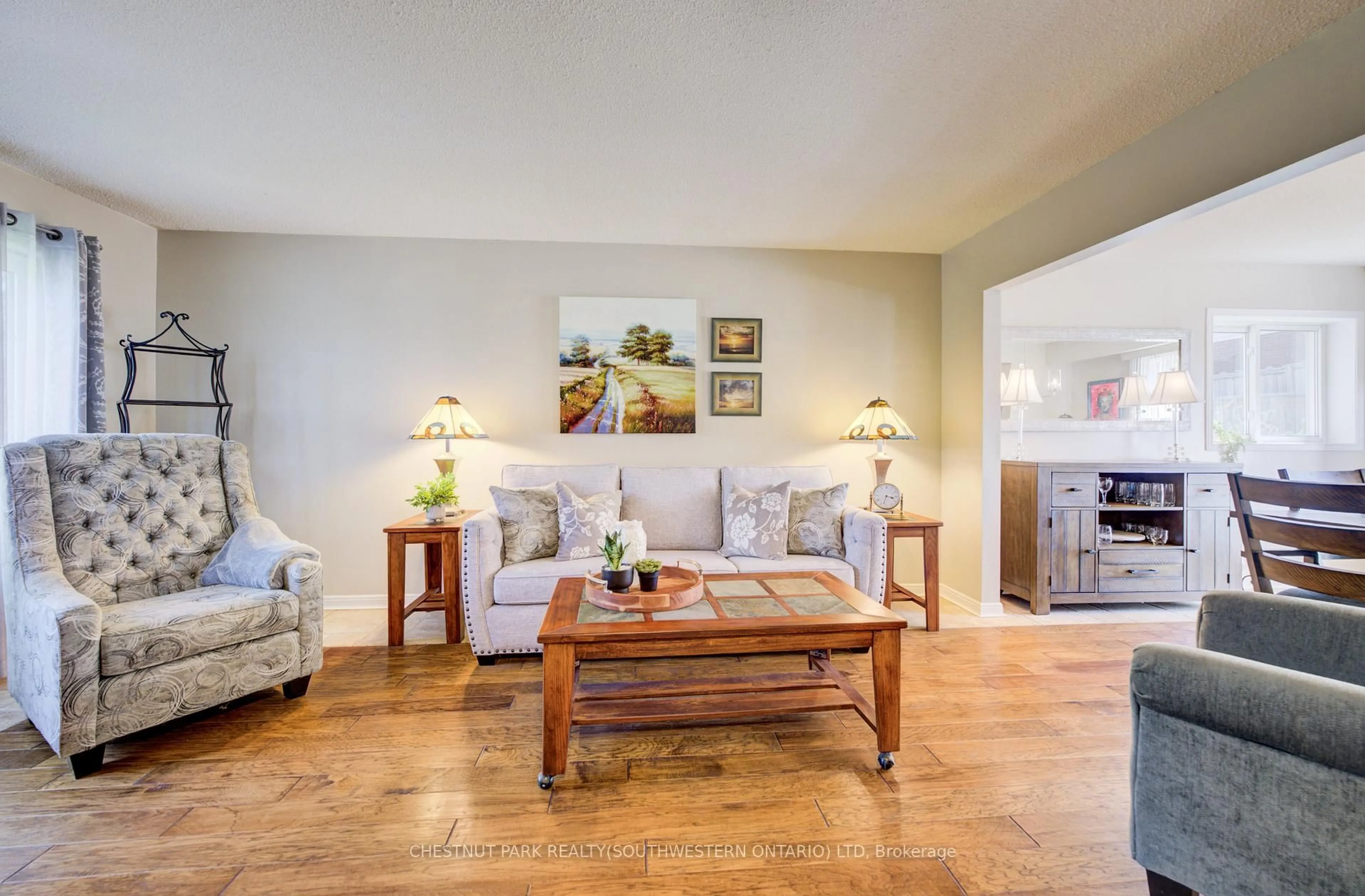 Living room with furniture, wood/laminate floor for 135 Royal Orchard Dr, Waterloo Ontario N2N 1S2