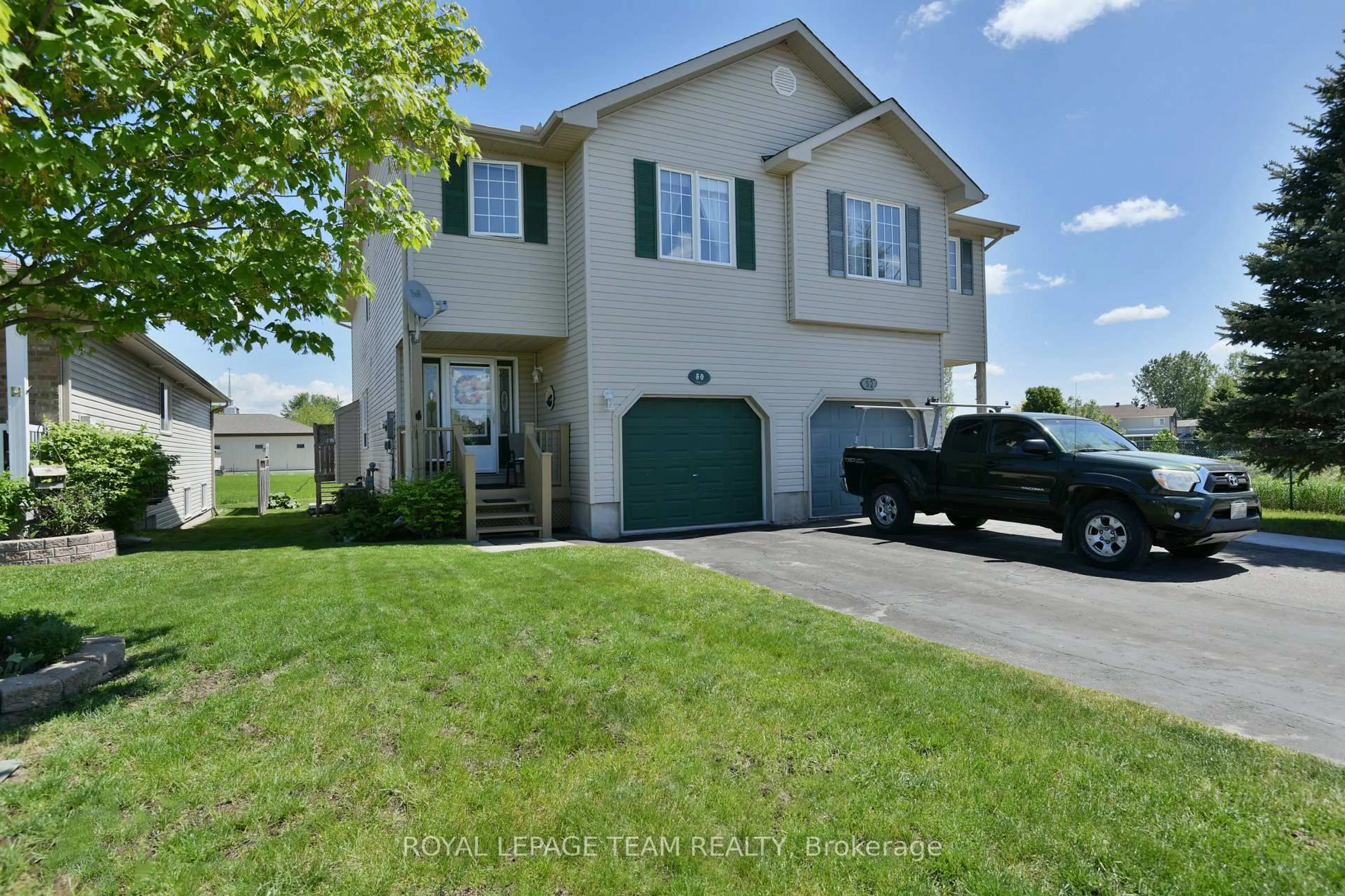 Home with vinyl exterior material, street for 50 Frieday St, Arnprior Ontario K7S 0A6