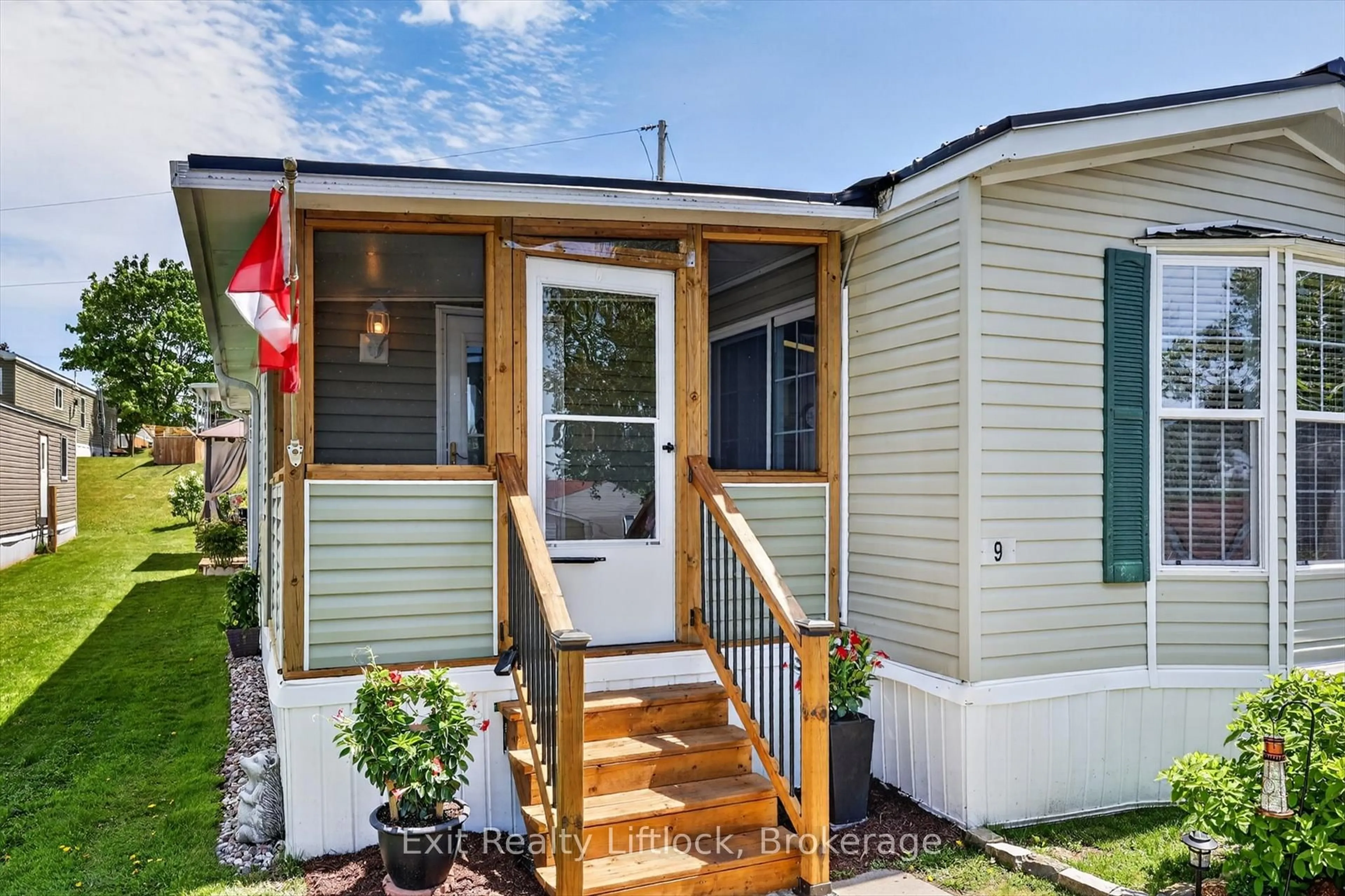Home with vinyl exterior material, street for 9 Poplar Dr, Otonabee-South Monaghan Ontario K0L 2G0