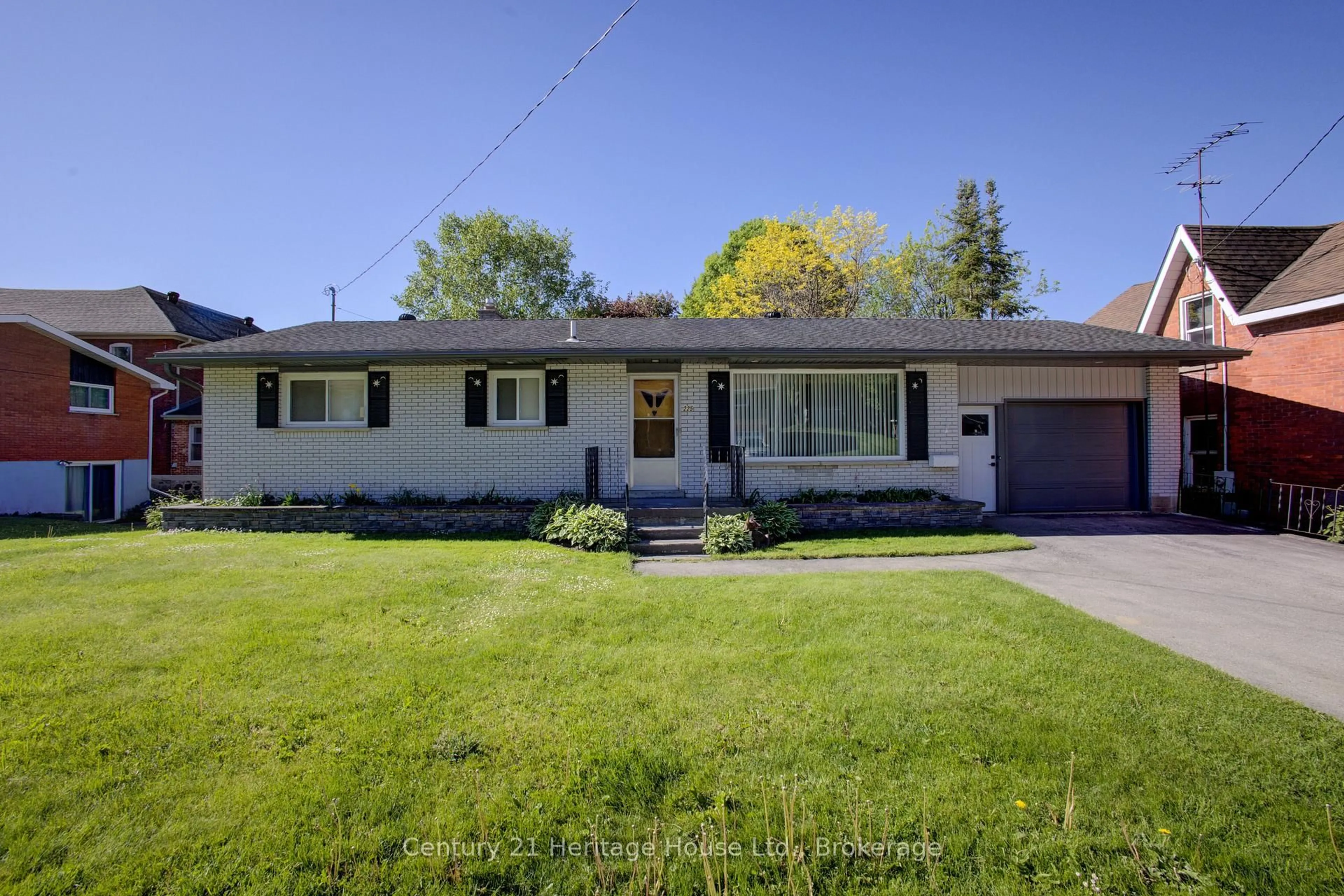 Home with vinyl exterior material, street for 225 George St, West Grey Ontario N0G 1R0