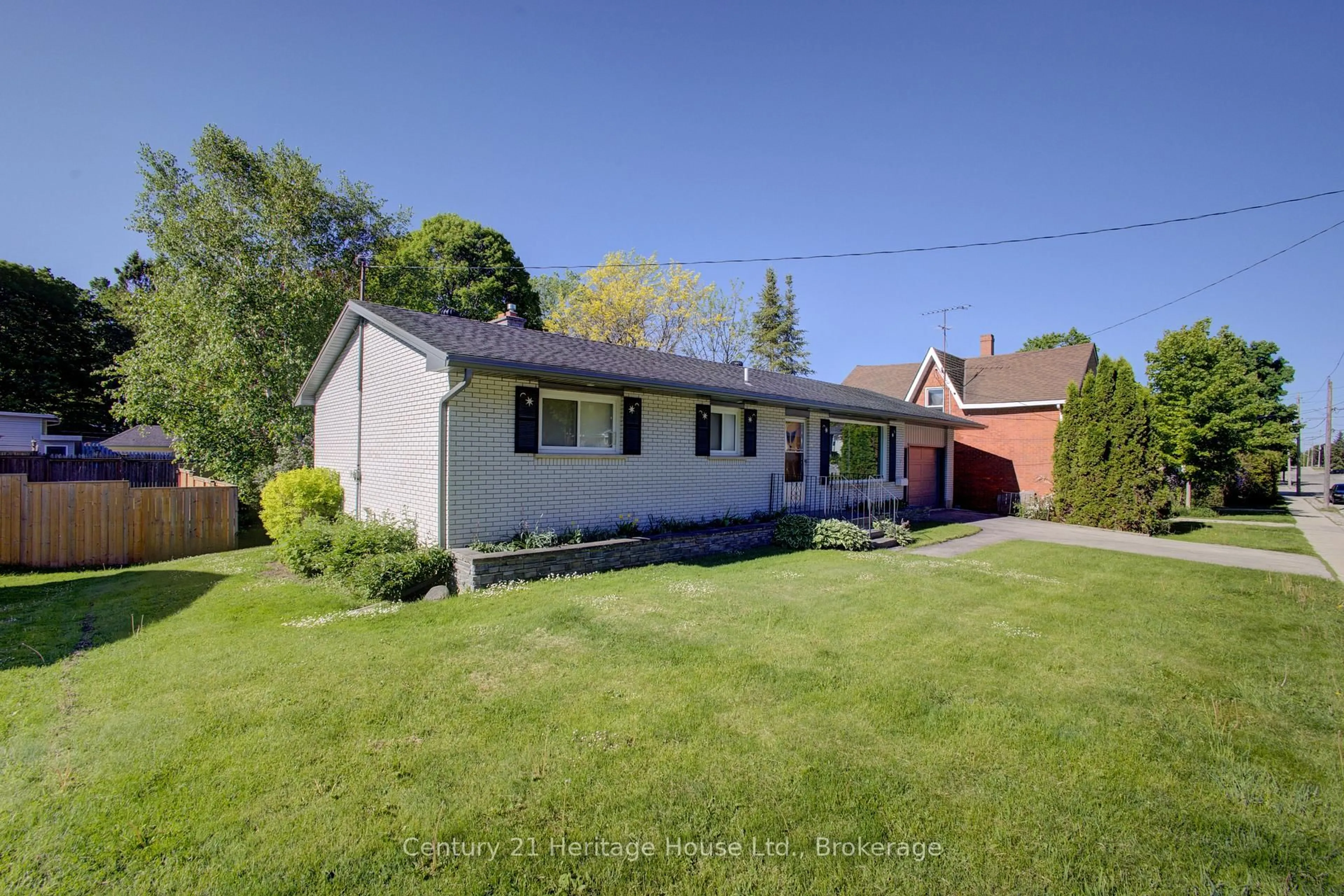 A pic from outside/outdoor area/front of a property/back of a property/a pic from drone, street for 225 George St, West Grey Ontario N0G 1R0