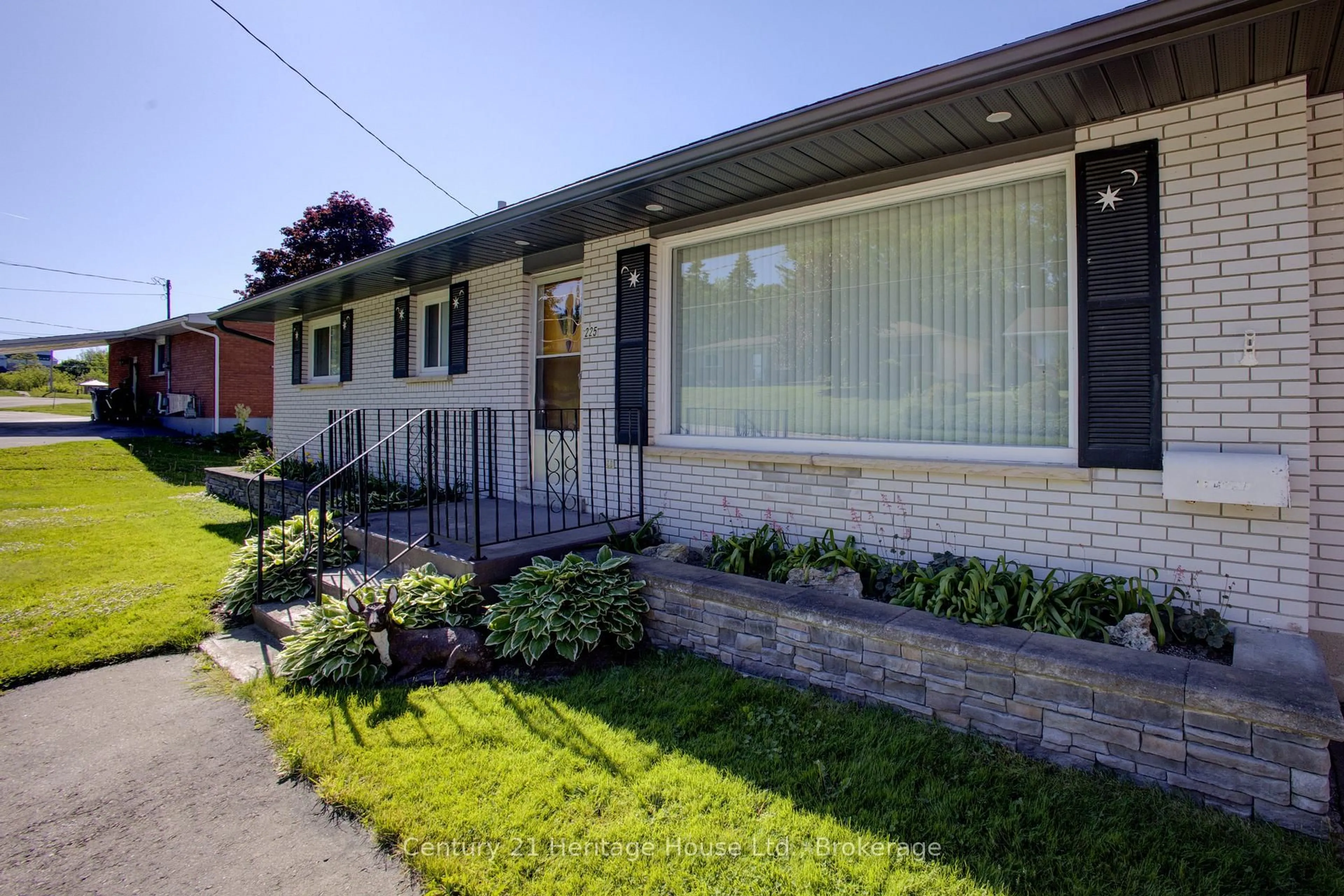 Home with brick exterior material, street for 225 George St, West Grey Ontario N0G 1R0