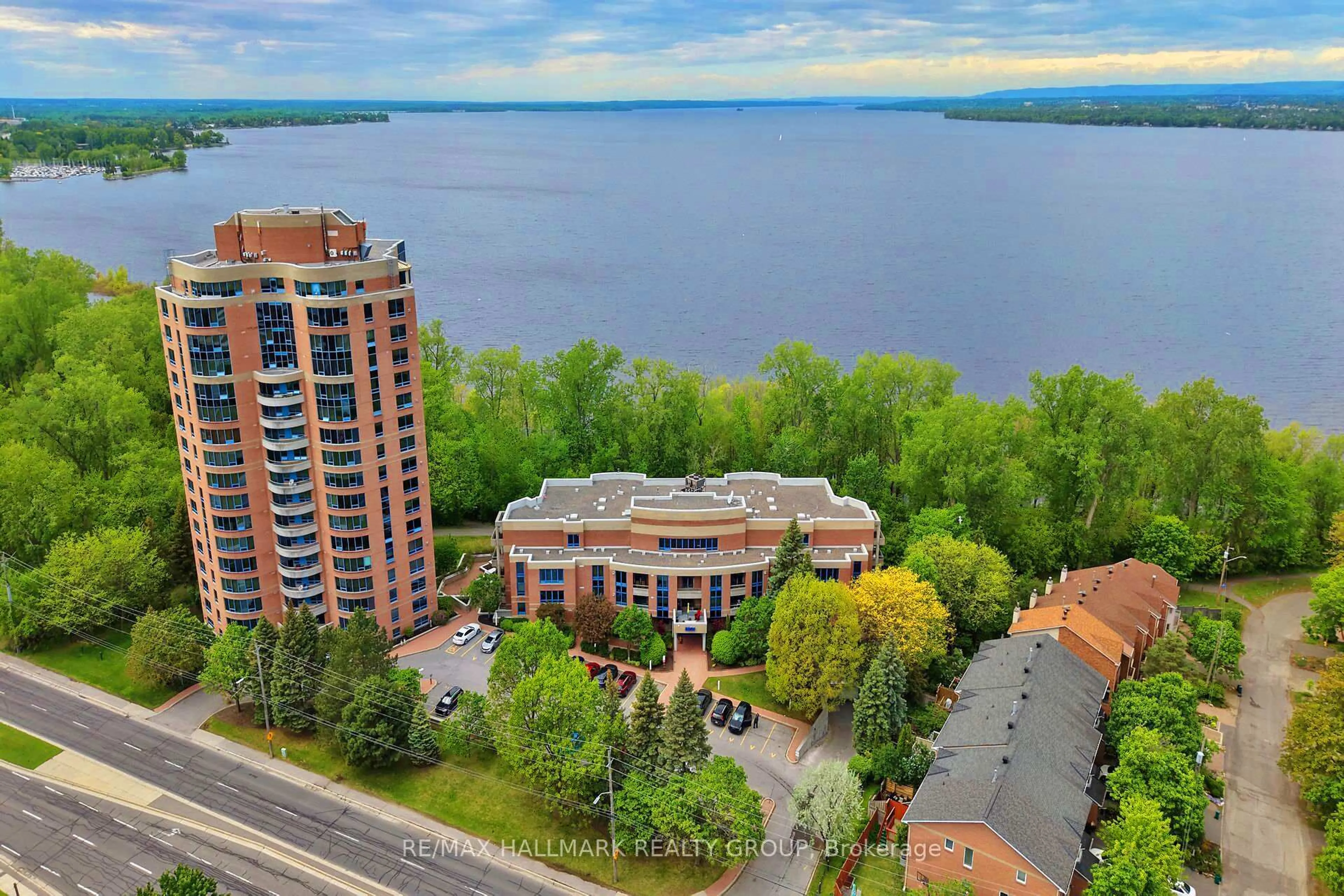 A pic from outside/outdoor area/front of a property/back of a property/a pic from drone, water/lake/river/ocean view for 3099 Carling Ave #205, Ottawa Ontario K2H 5A6