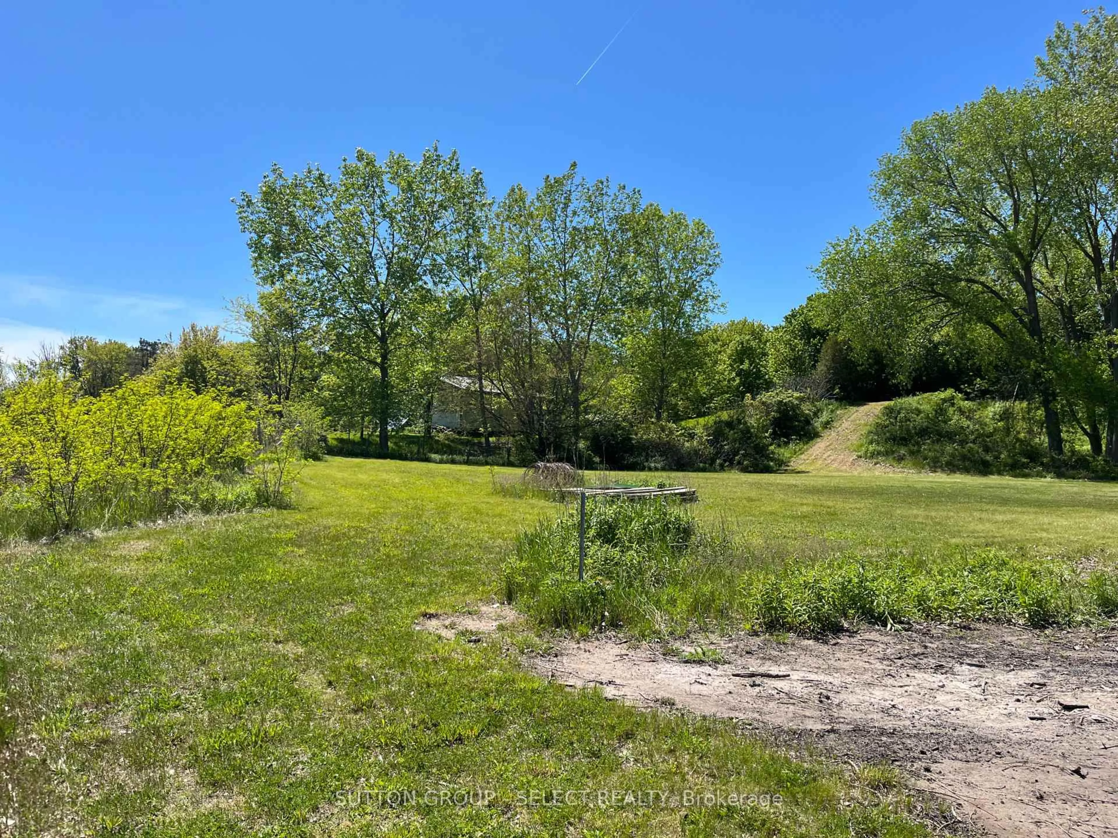 A pic from outside/outdoor area/front of a property/back of a property/a pic from drone, forest/trees view for 7504 Talbot Tr, Chatham-Kent Ontario N0P 1A0