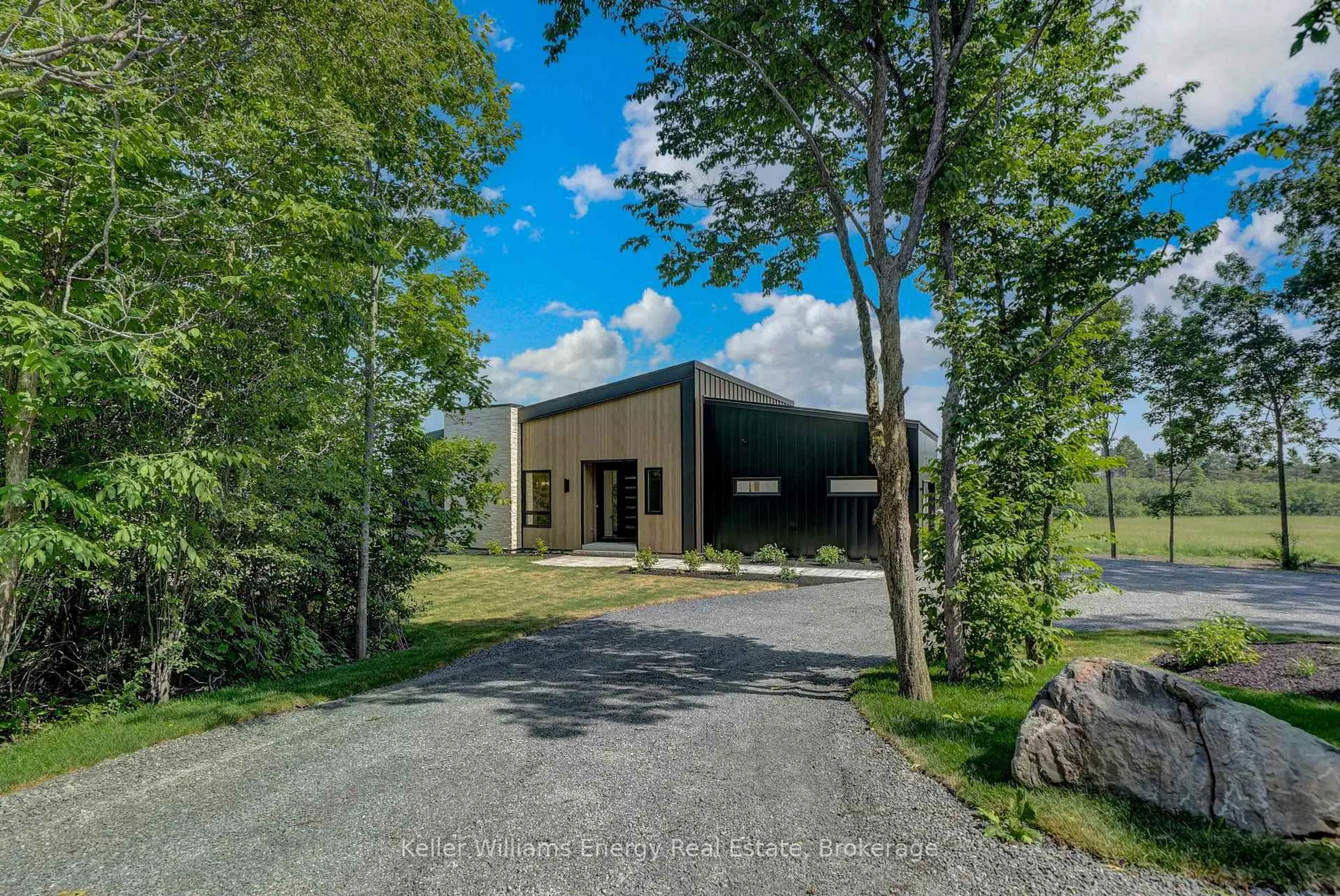 A pic from outside/outdoor area/front of a property/back of a property/a pic from drone, unknown for 13 Partridge Hollow Rd, Prince Edward County Ontario K0K 1T0
