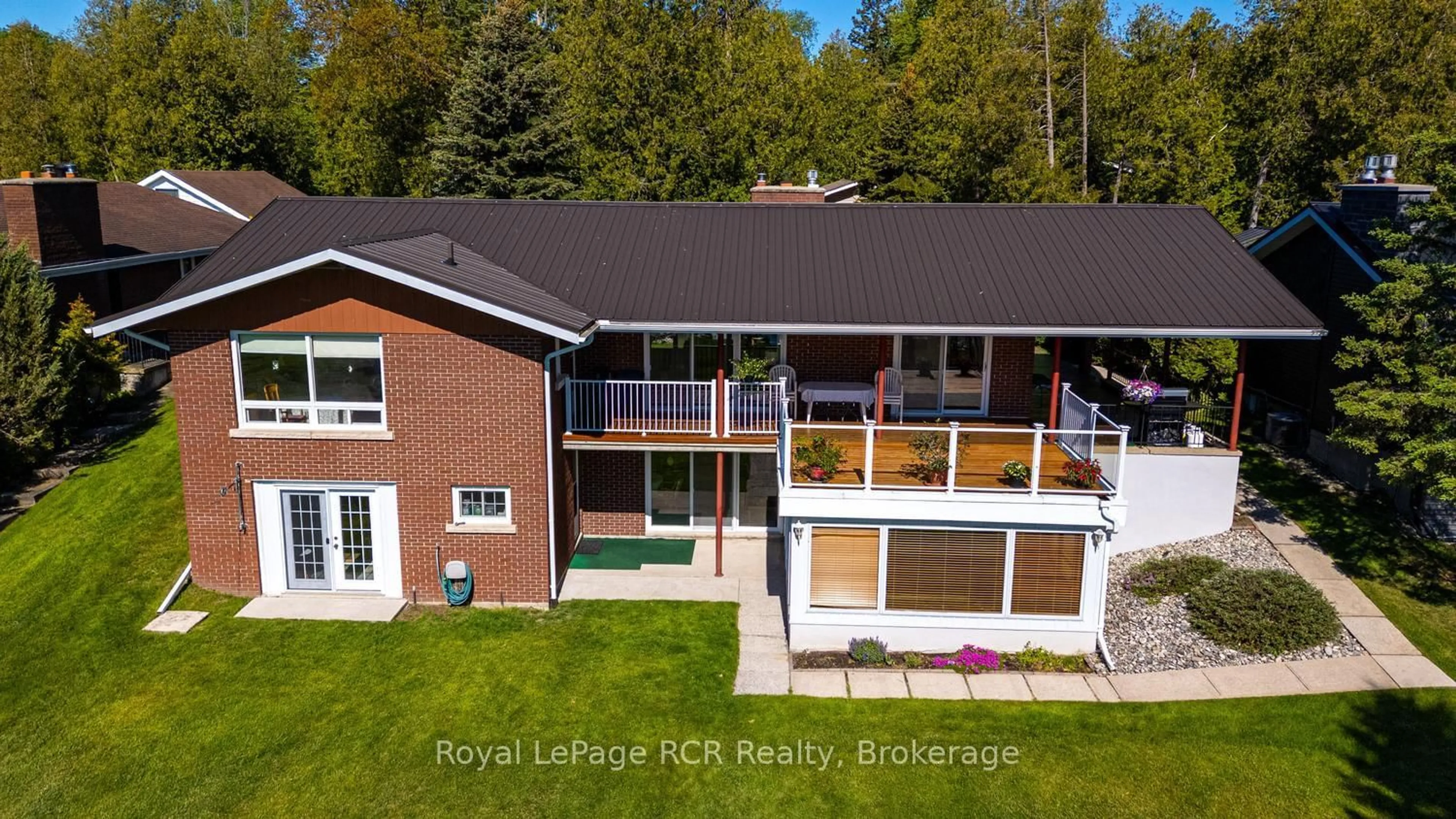A pic from outside/outdoor area/front of a property/back of a property/a pic from drone, unknown for 405 Balmy Beach Rd, Georgian Bluffs Ontario N4K 5N4