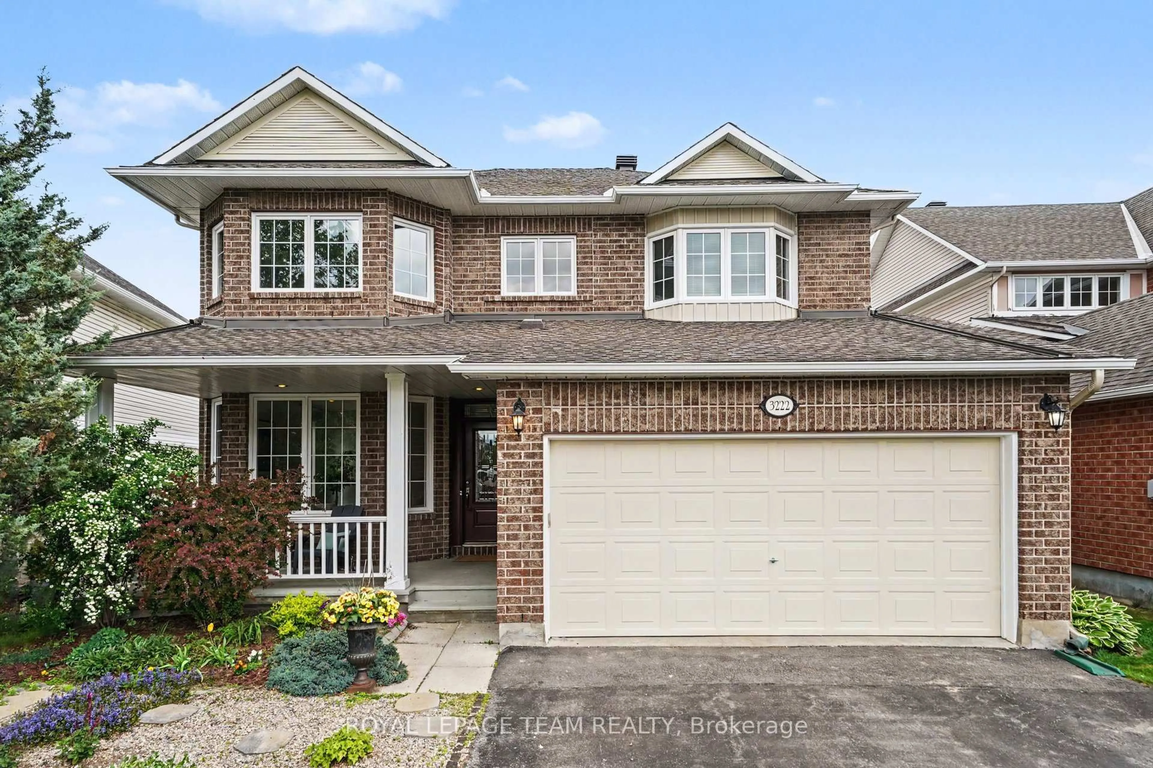 Home with brick exterior material, street for 3222 Carriage Hill Pl, Ottawa Ontario K1T 3X5