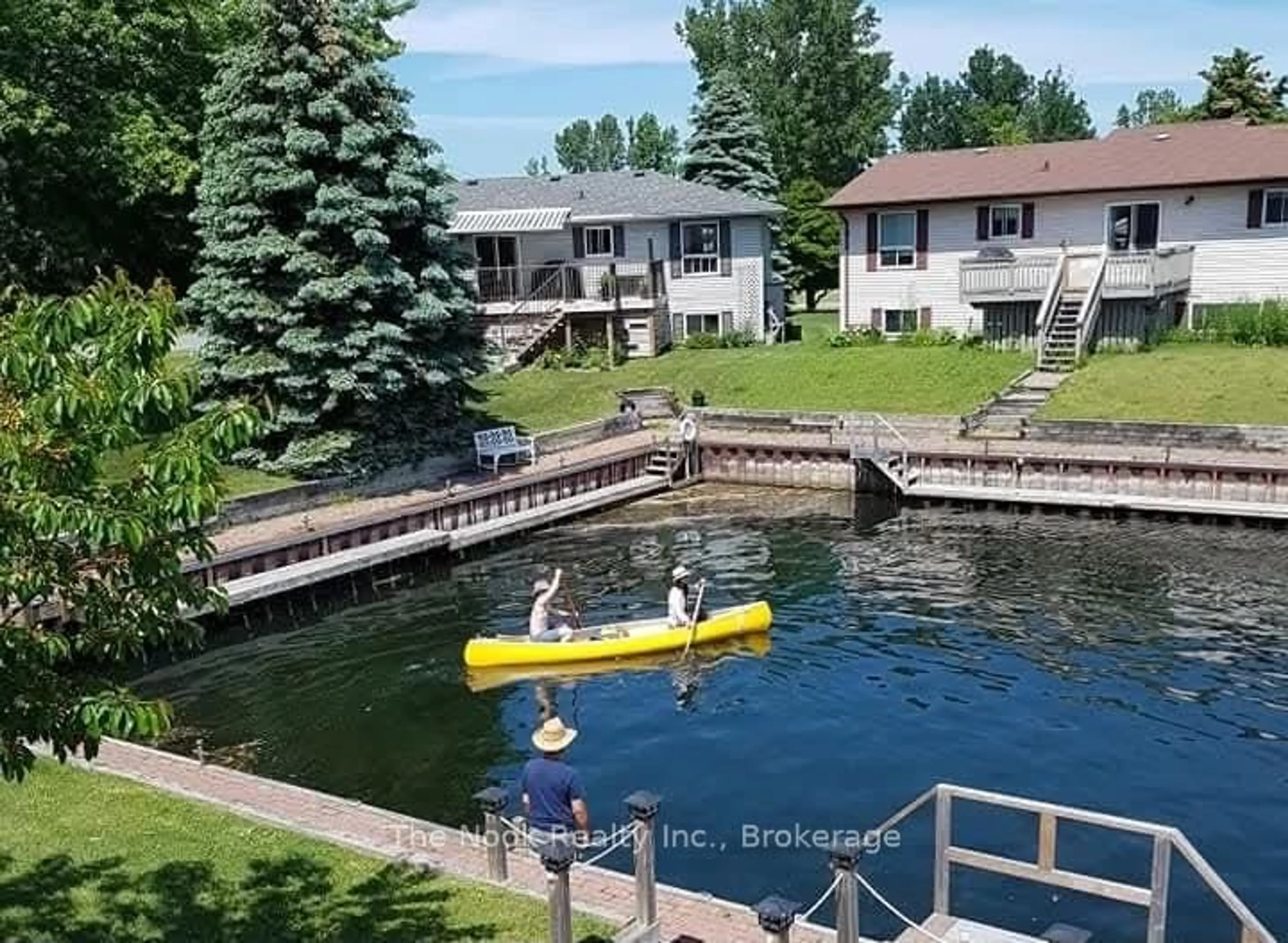 A pic from outside/outdoor area/front of a property/back of a property/a pic from drone, water/lake/river/ocean view for 12 Rogers Rd, Brighton Ontario K0K 1H0
