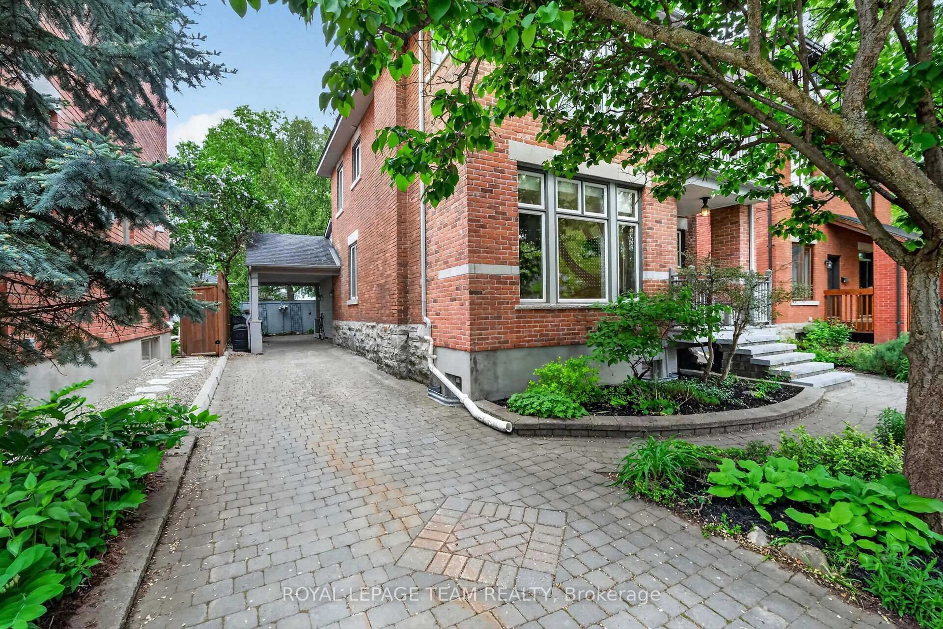 Home with brick exterior material, street for 31 Wendover Ave, Ottawa Ontario K1S 4Z6