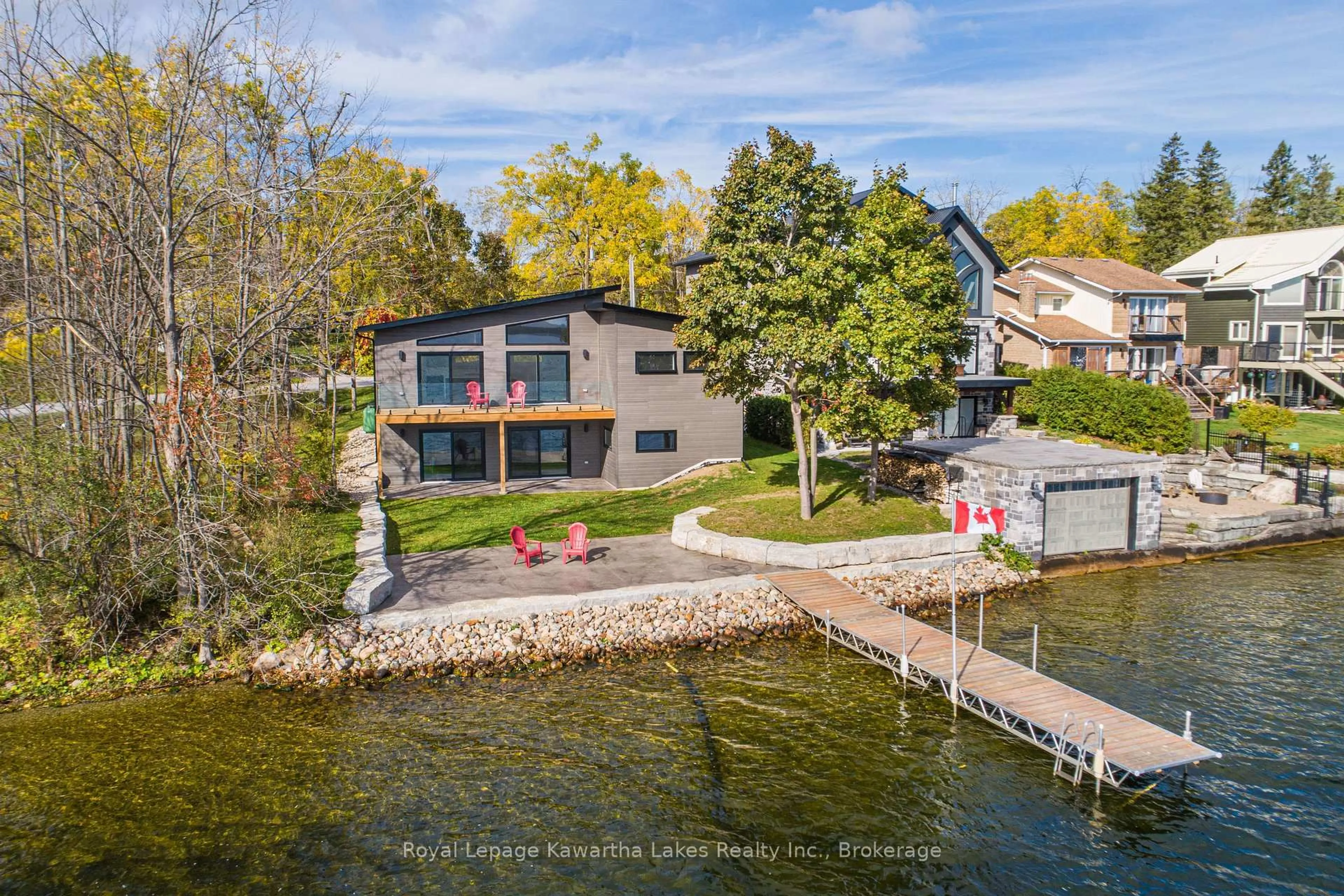 A pic from outside/outdoor area/front of a property/back of a property/a pic from drone, water/lake/river/ocean view for 532 Long Beach Rd, Kawartha Lakes Ontario K0M 1G0
