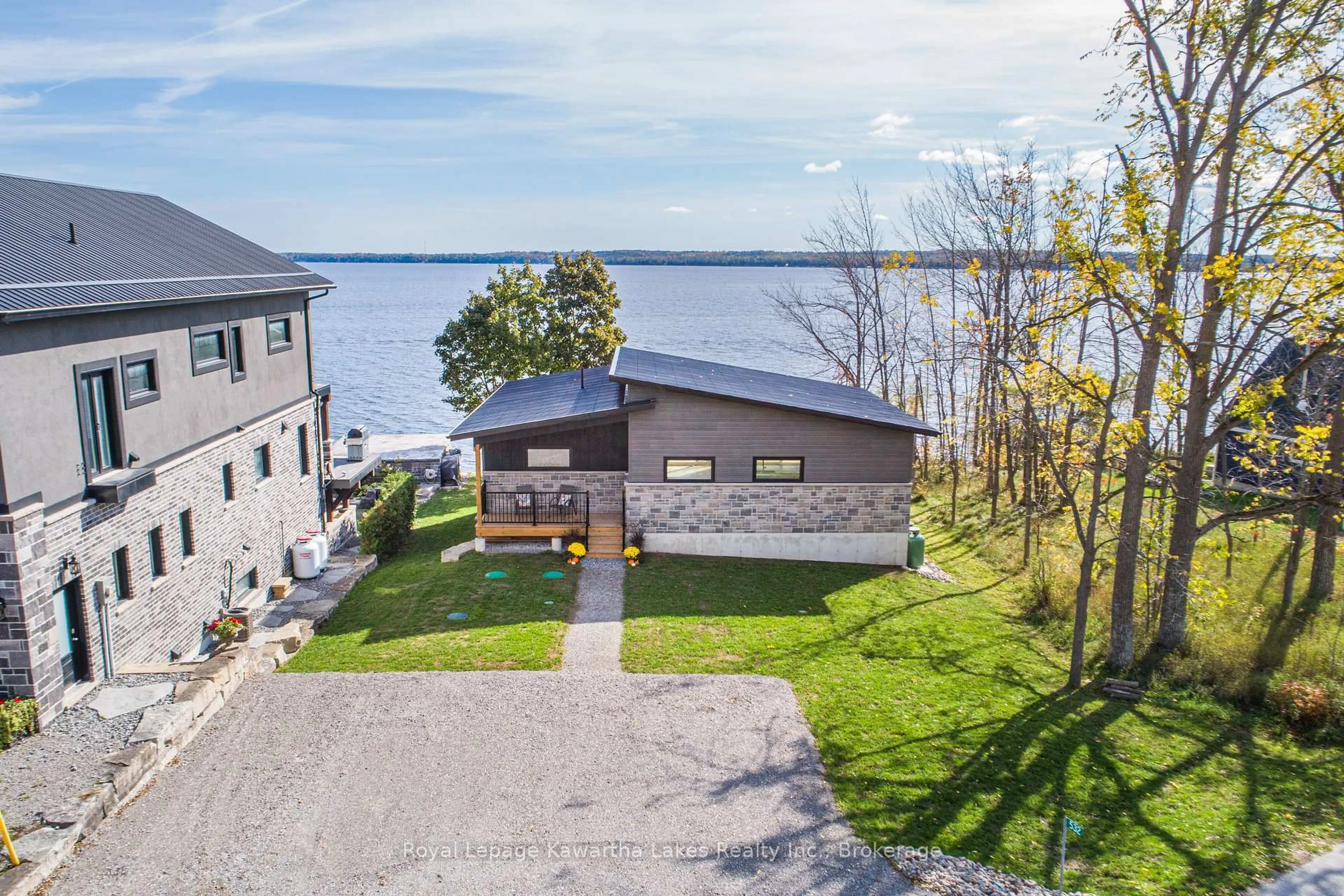 A pic from outside/outdoor area/front of a property/back of a property/a pic from drone, water/lake/river/ocean view for 532 Long Beach Rd, Kawartha Lakes Ontario K0M 1G0
