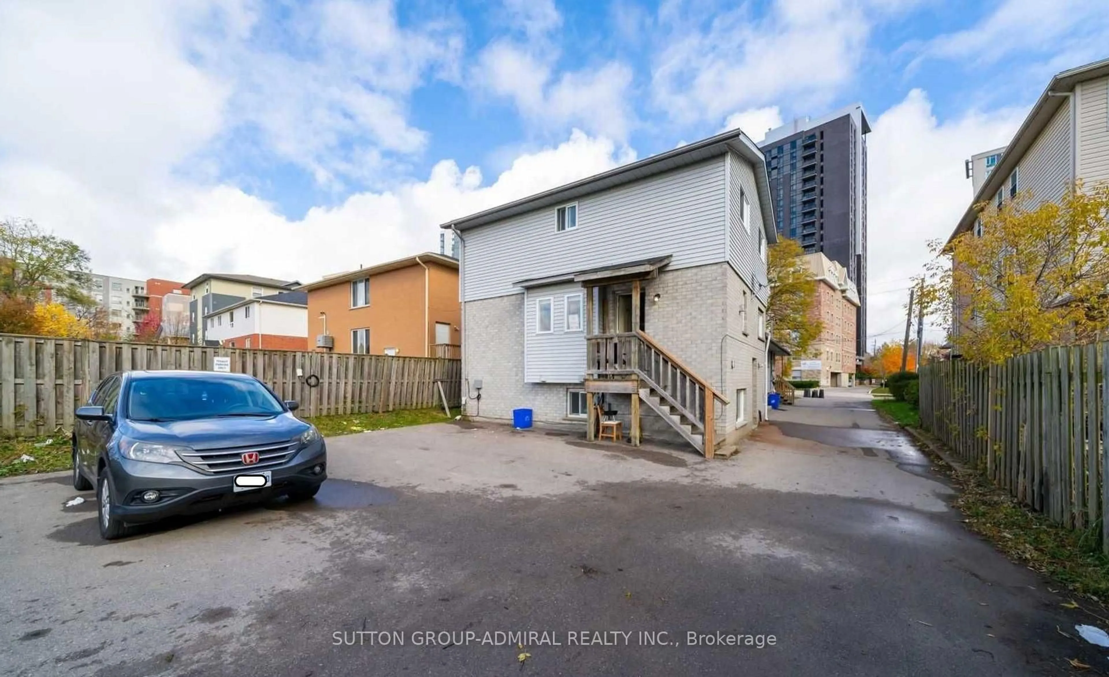 A pic from outside/outdoor area/front of a property/back of a property/a pic from drone, street for 329 Spruce St, Waterloo Ontario N2L 3M6