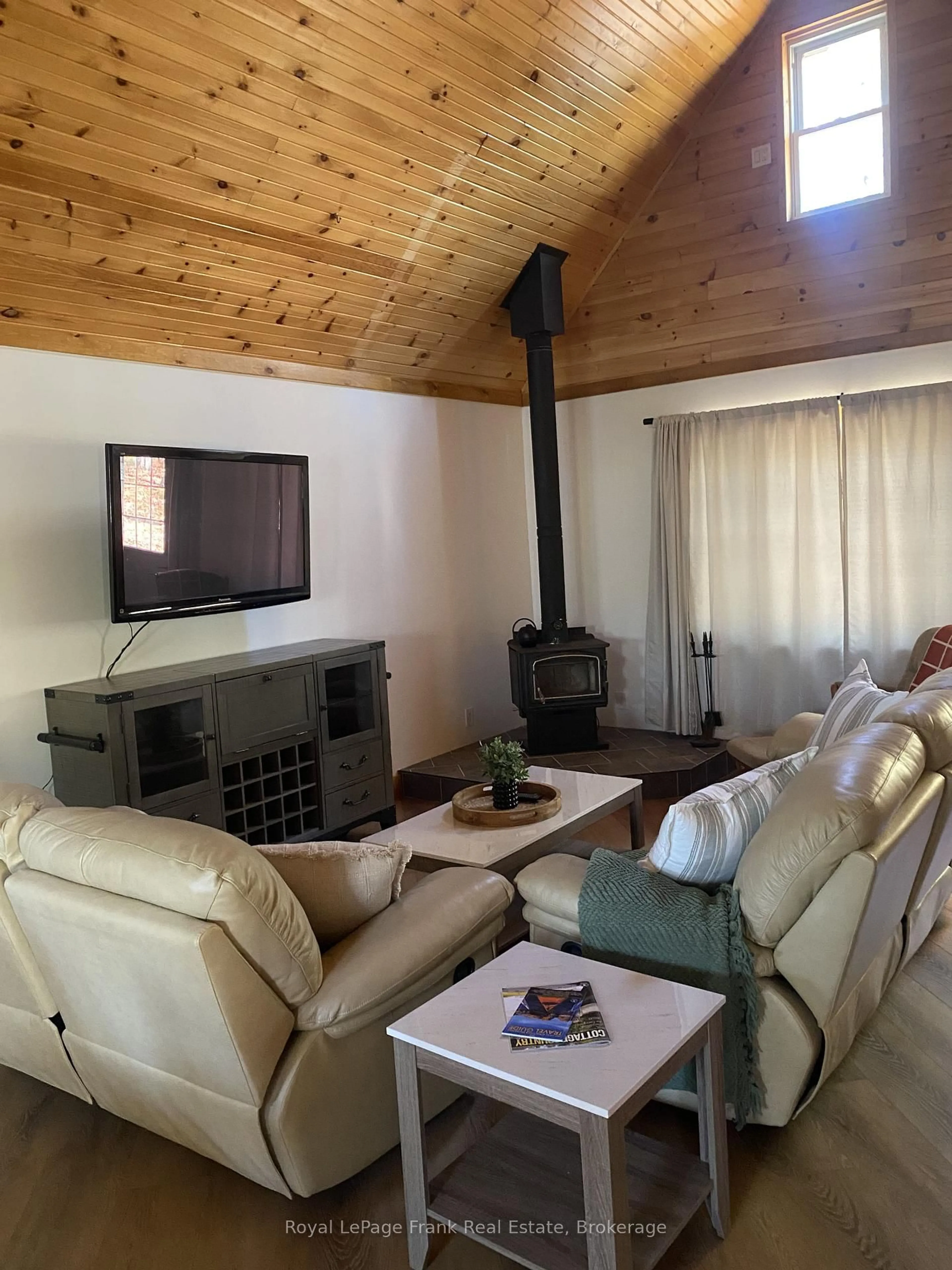 Living room with furniture, wood/laminate floor for 595 Old Diamond Lake Rd, Bancroft Ontario K0L 1C0