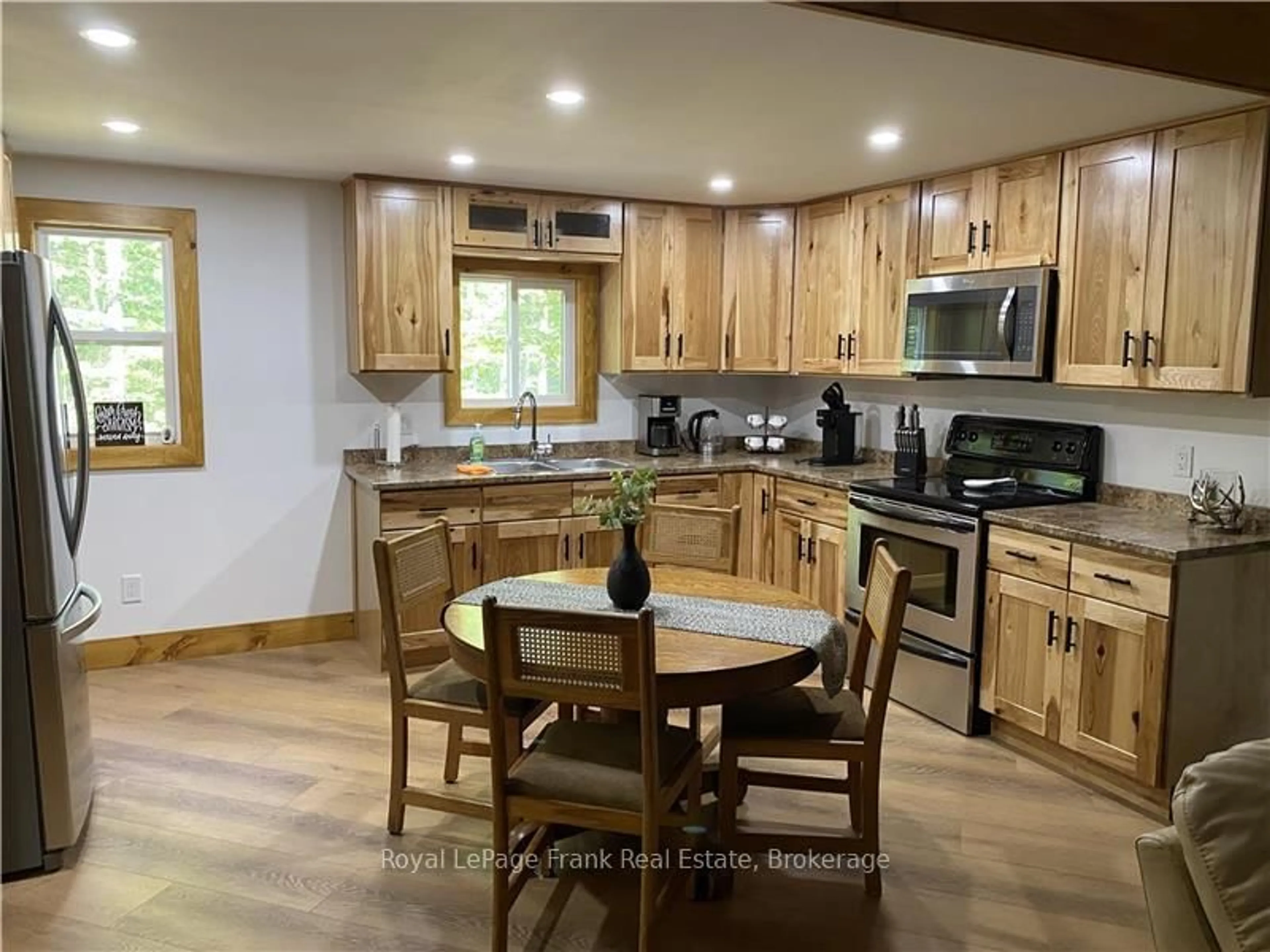 Open concept kitchen, wood/laminate floor for 595 Old Diamond Lake Rd, Bancroft Ontario K0L 1C0