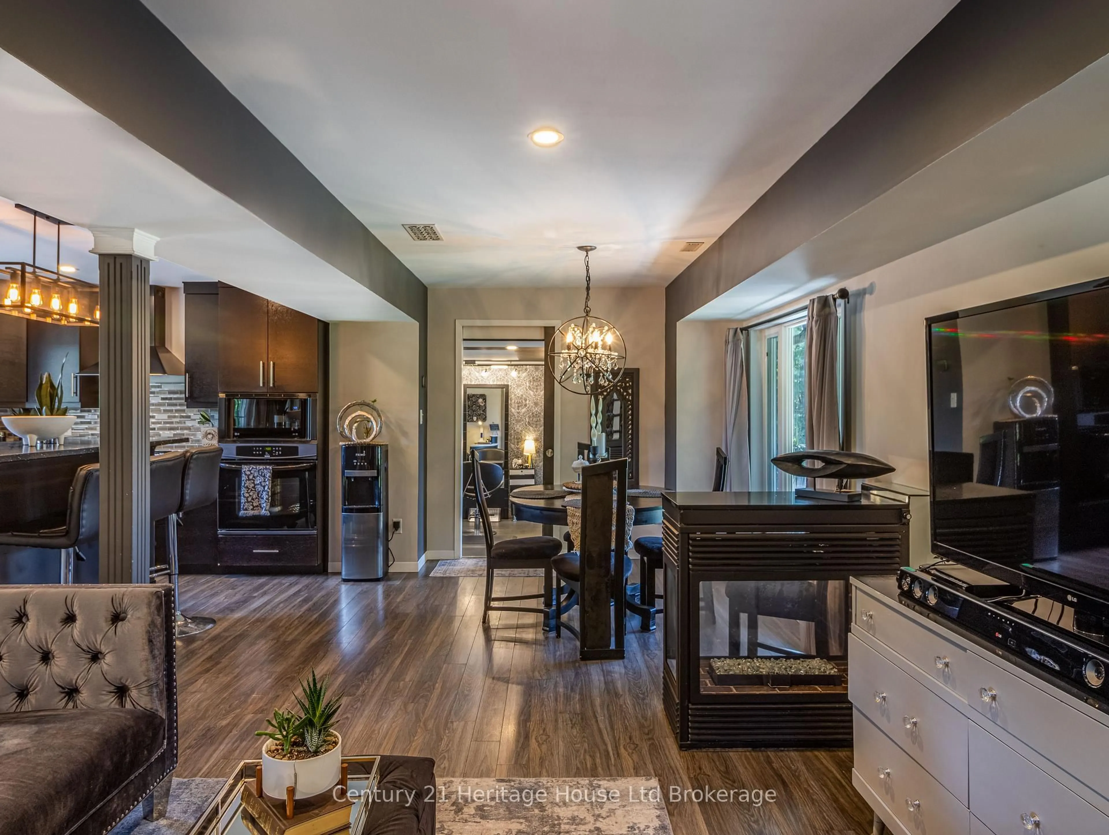 Open concept kitchen, wood/laminate floor for 545228 Pattullo Ave, Norwich Ontario N4S 7W3