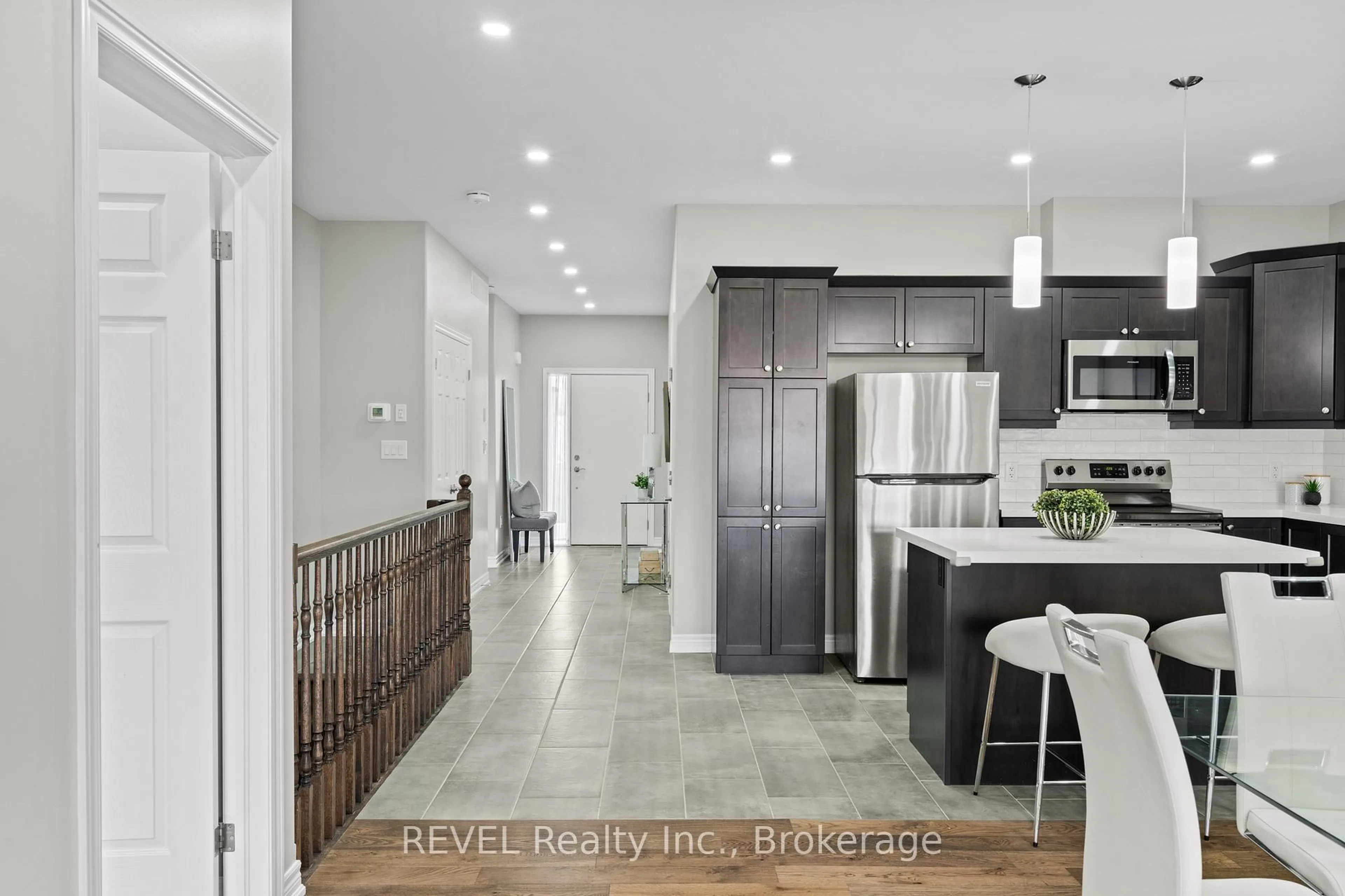Open concept kitchen, ceramic/tile floor for 7138 PARSA St #7, Niagara Falls Ontario L2H 3W1