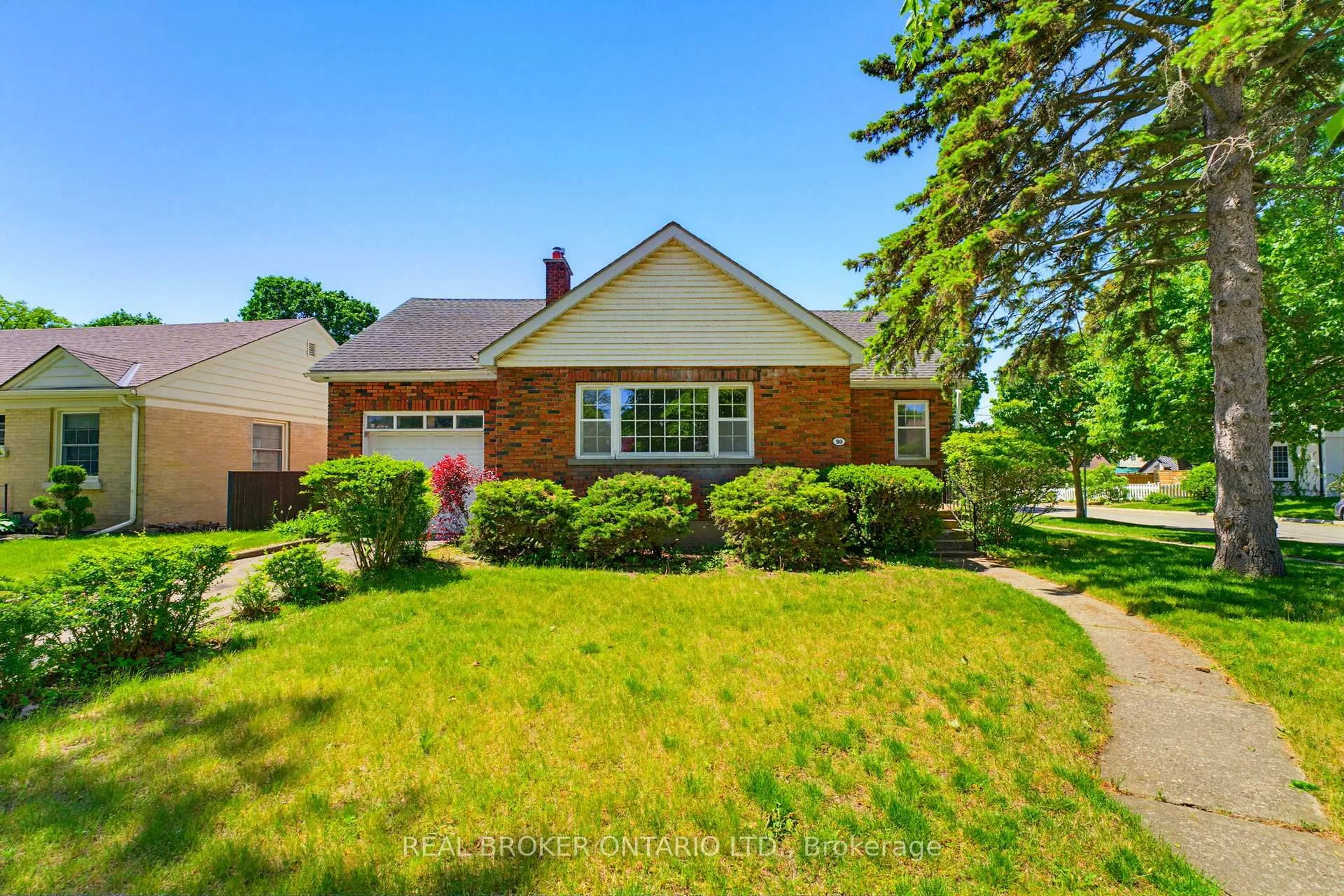 Home with brick exterior material, street for 30 Lincoln Ave, Brantford Ontario N3T 4S4