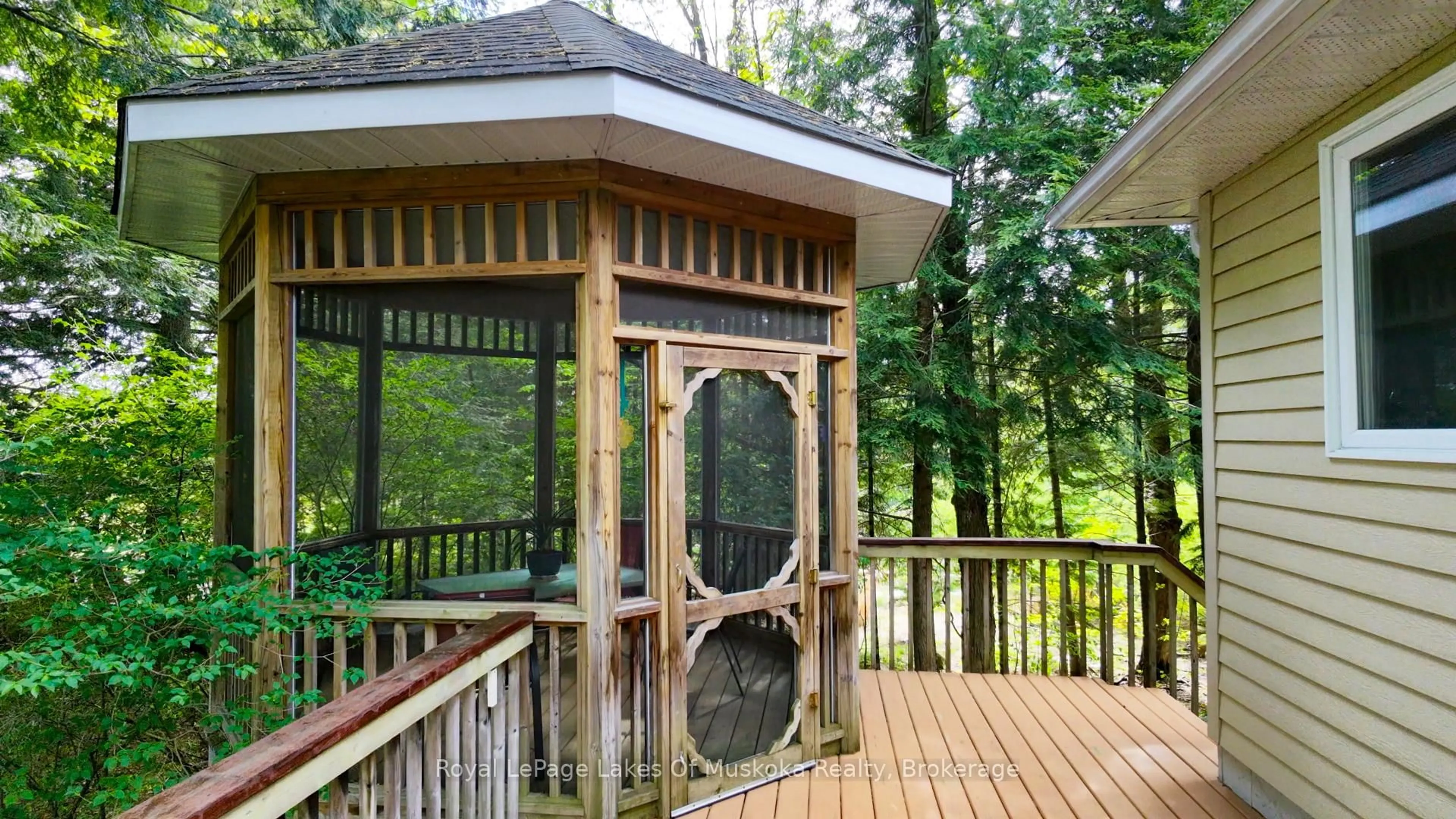Patio, forest/trees view for 20 Deerhurst Highlands Dr, Huntsville Ontario P1H 1B1