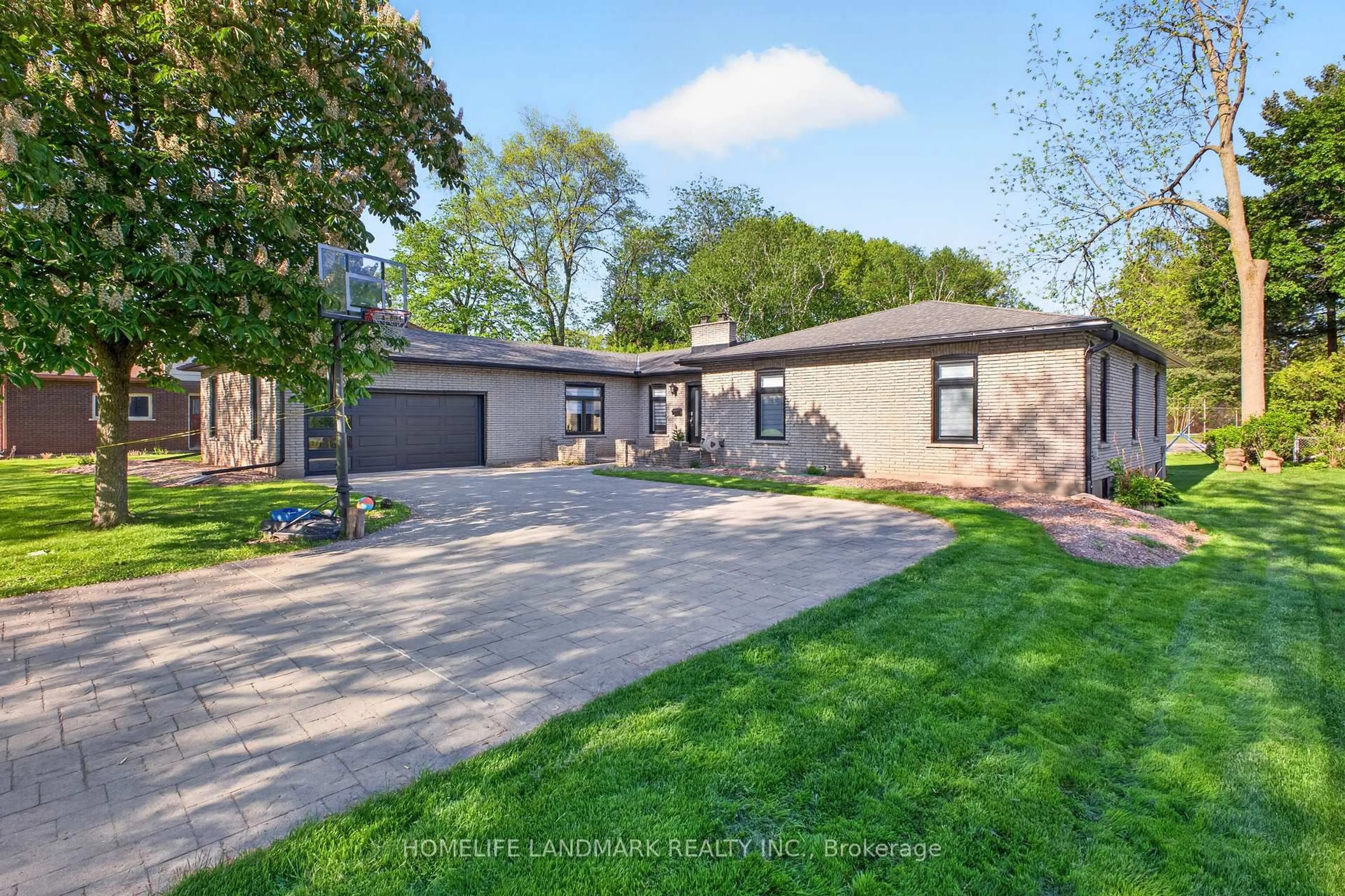 Home with brick exterior material, street for 7123 McMillan Dr, Niagara Falls Ontario L2G 2N1