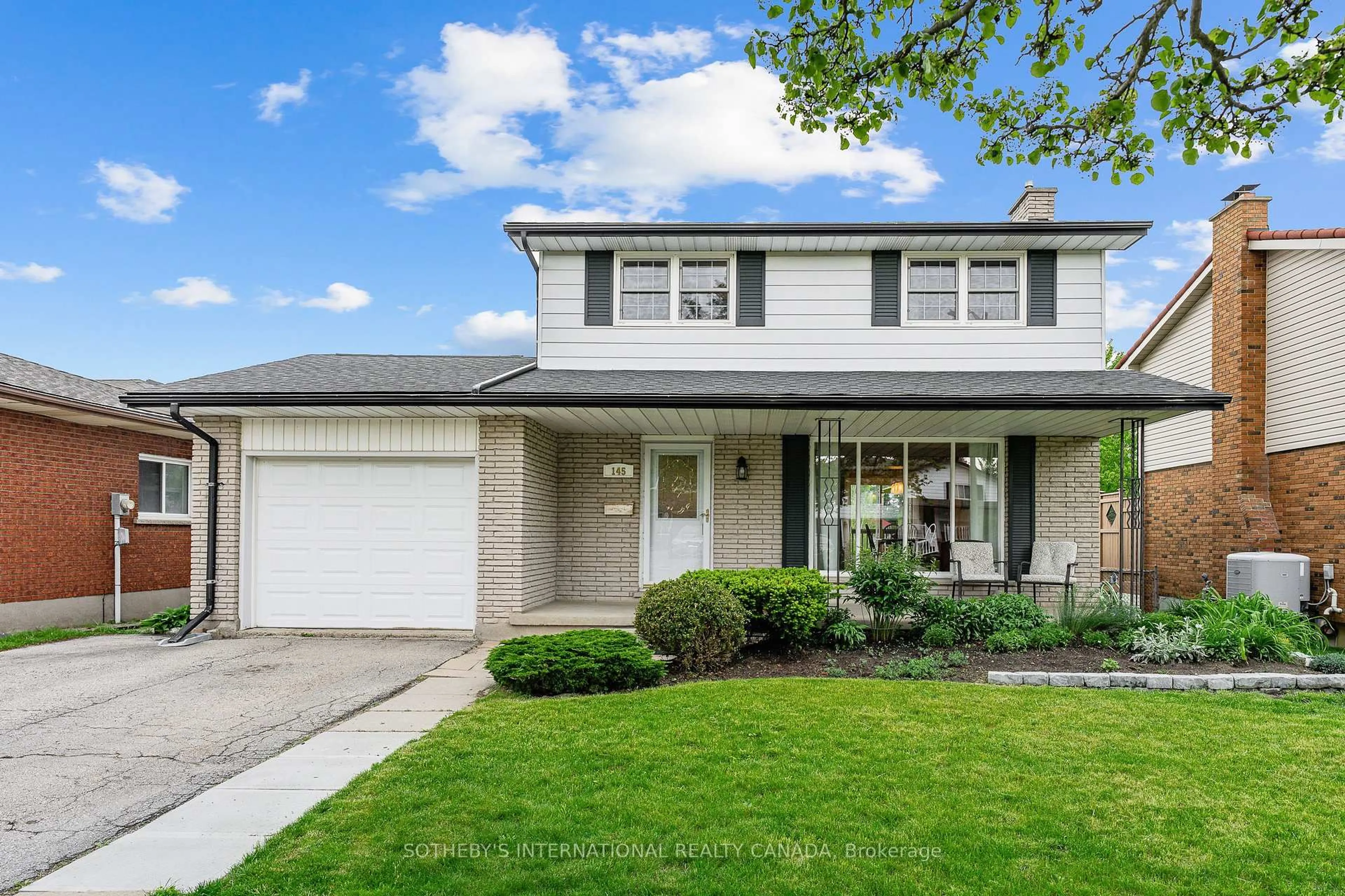 Home with vinyl exterior material, street for 145 Westchester Dr, Kitchener Ontario N2B 3L6