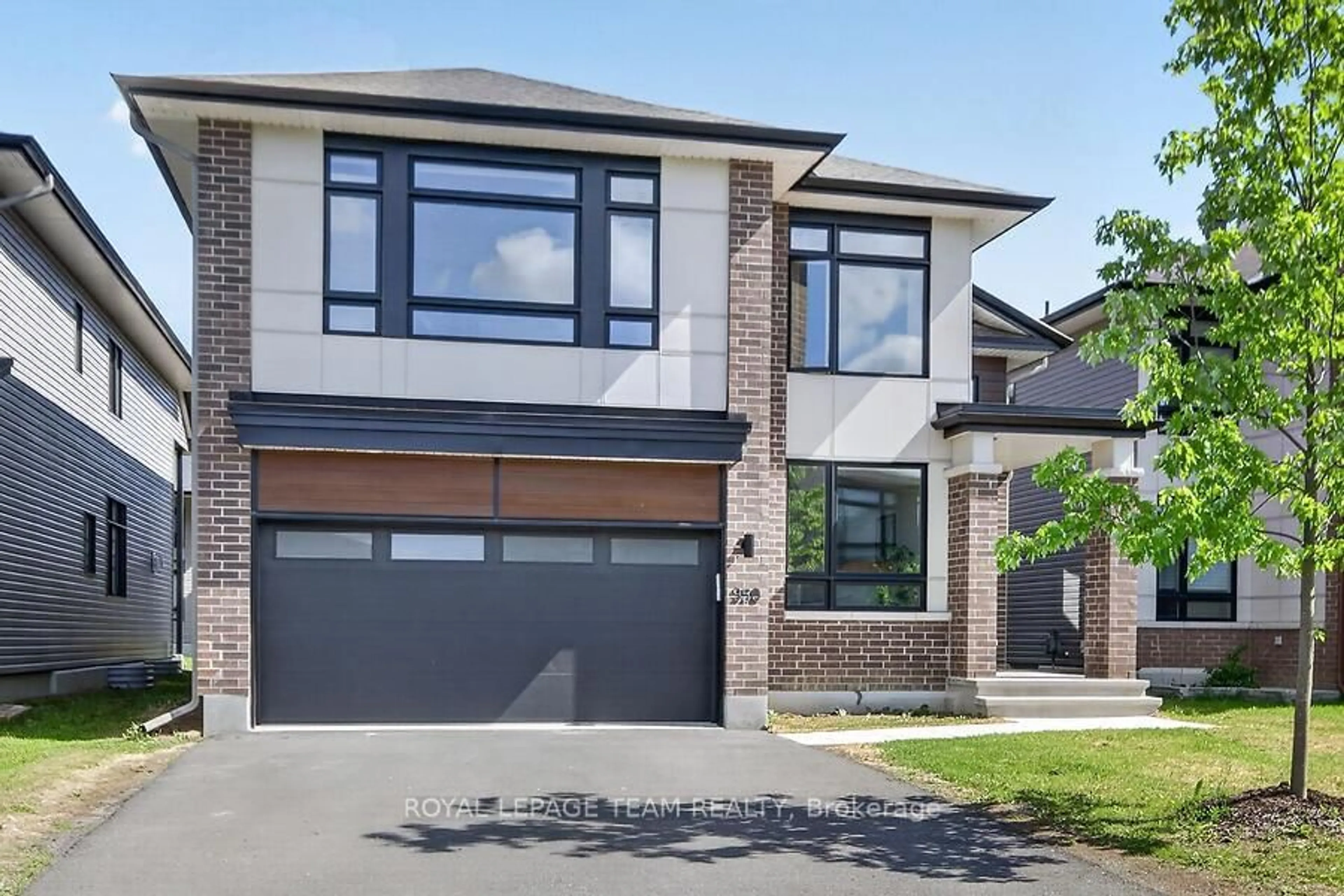 Home with brick exterior material, street for 950 Islington Way, Leitrim Ontario K1A 0T7