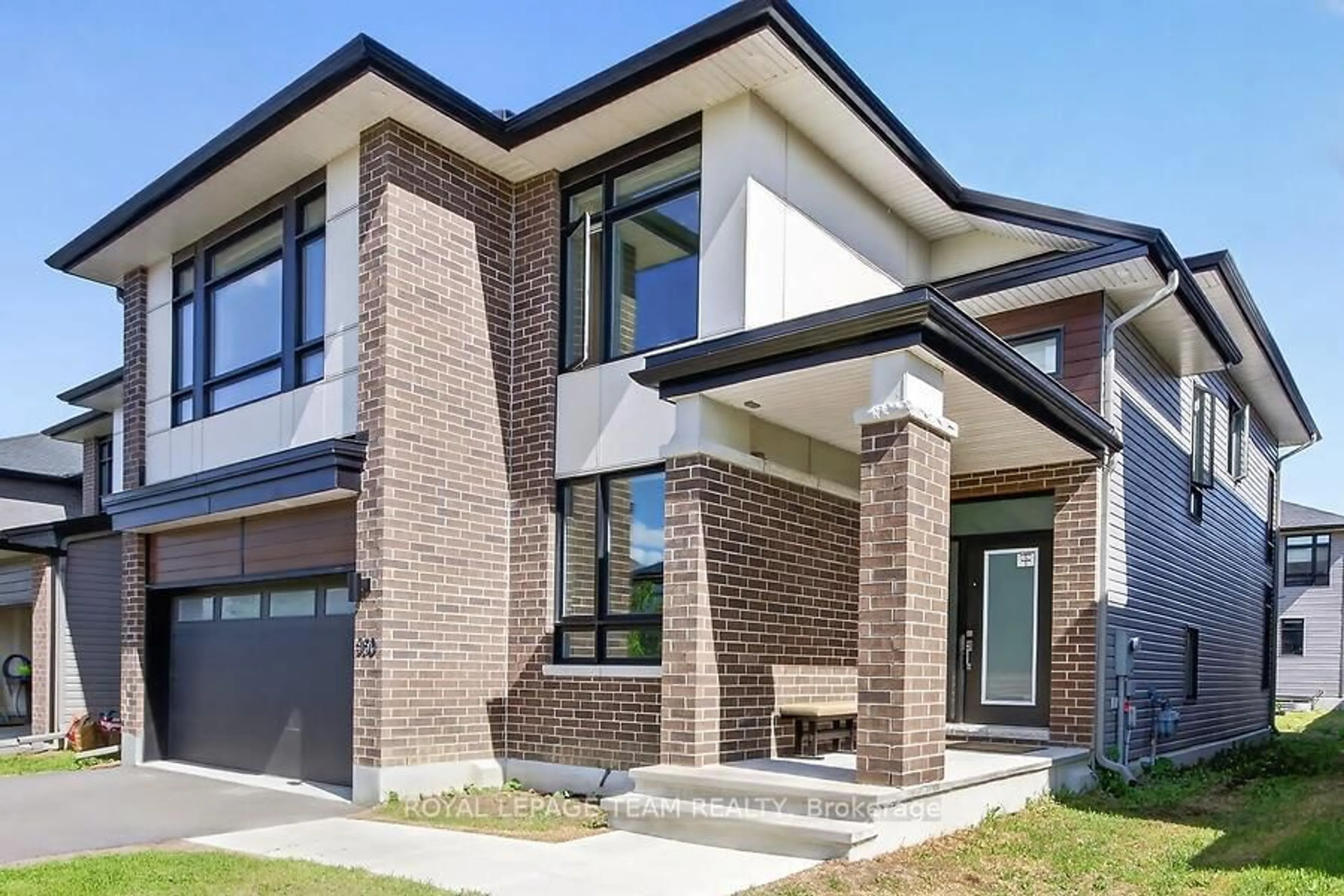 Home with brick exterior material, street for 950 Islington Way, Leitrim Ontario K1A 0T7