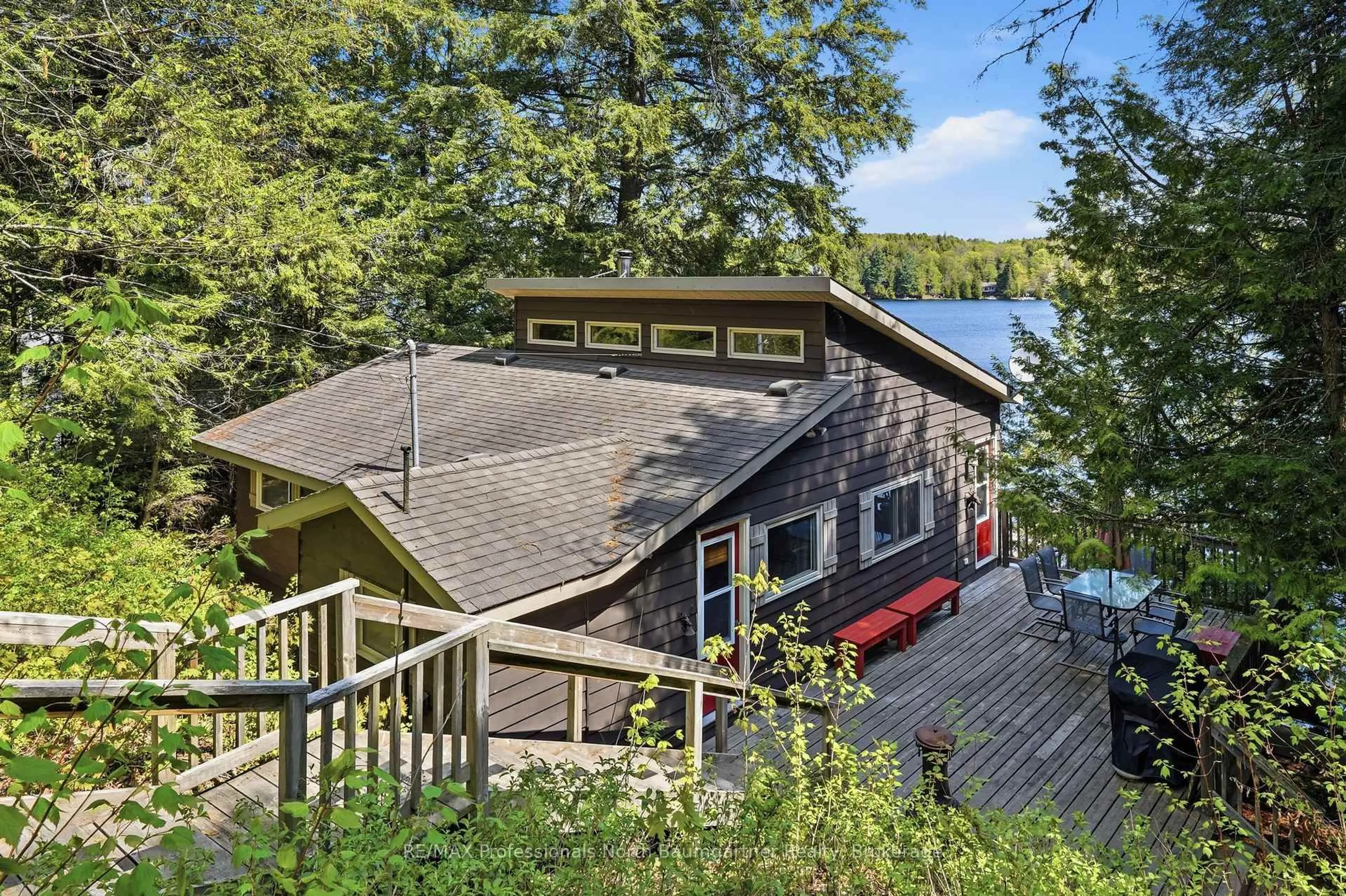 A pic from outside/outdoor area/front of a property/back of a property/a pic from drone, water/lake/river/ocean view for 2301 Sumcot Rd, Dysart et al Ontario K0L 1M1