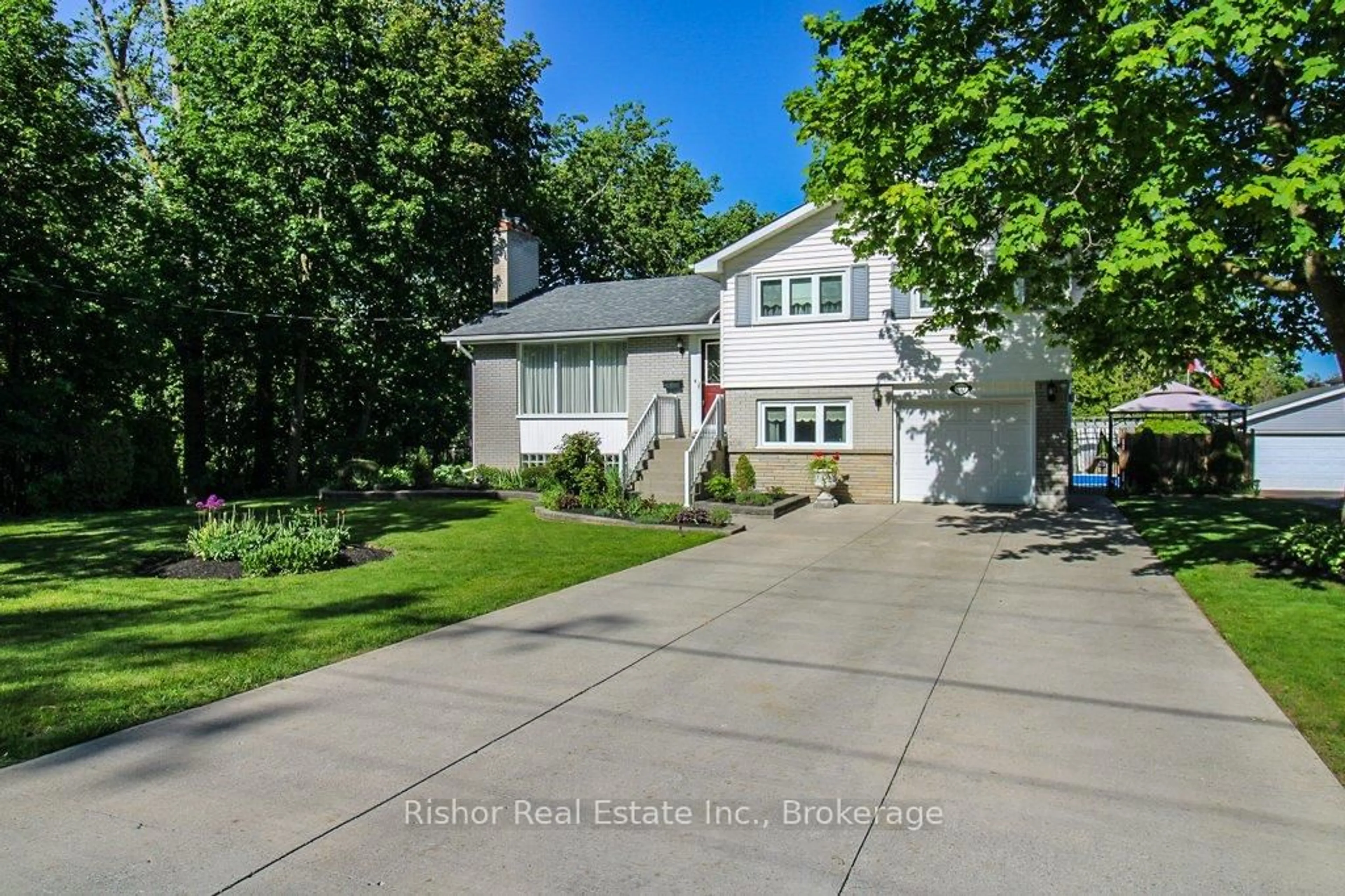 A pic from outside/outdoor area/front of a property/back of a property/a pic from drone, water/lake/river/ocean view for 80 Kawartha Heights Blvd, Peterborough Ontario K9J 1N7
