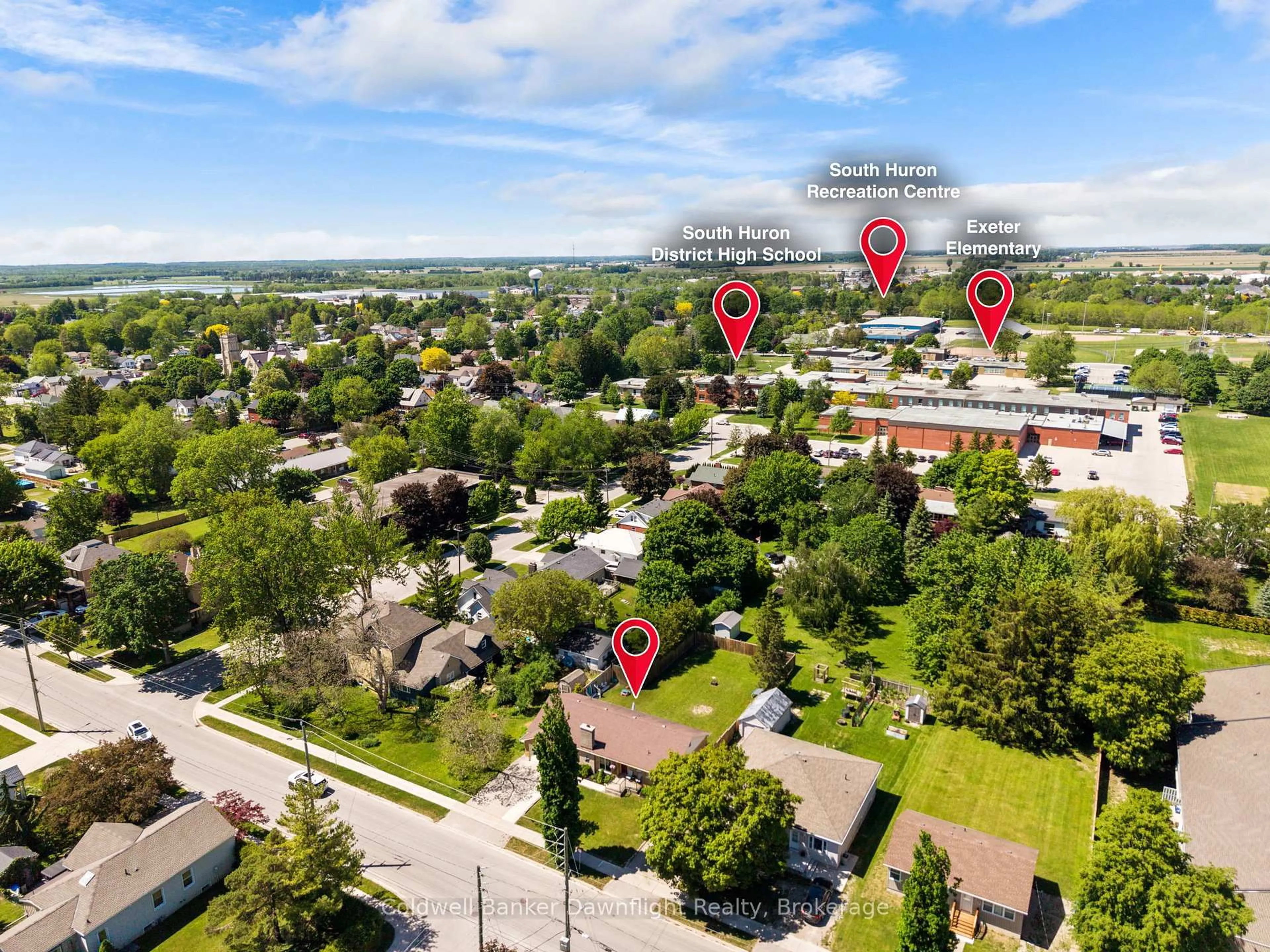 A pic from outside/outdoor area/front of a property/back of a property/a pic from drone, street for 116 Sanders St, South Huron Ontario N0M 1S1