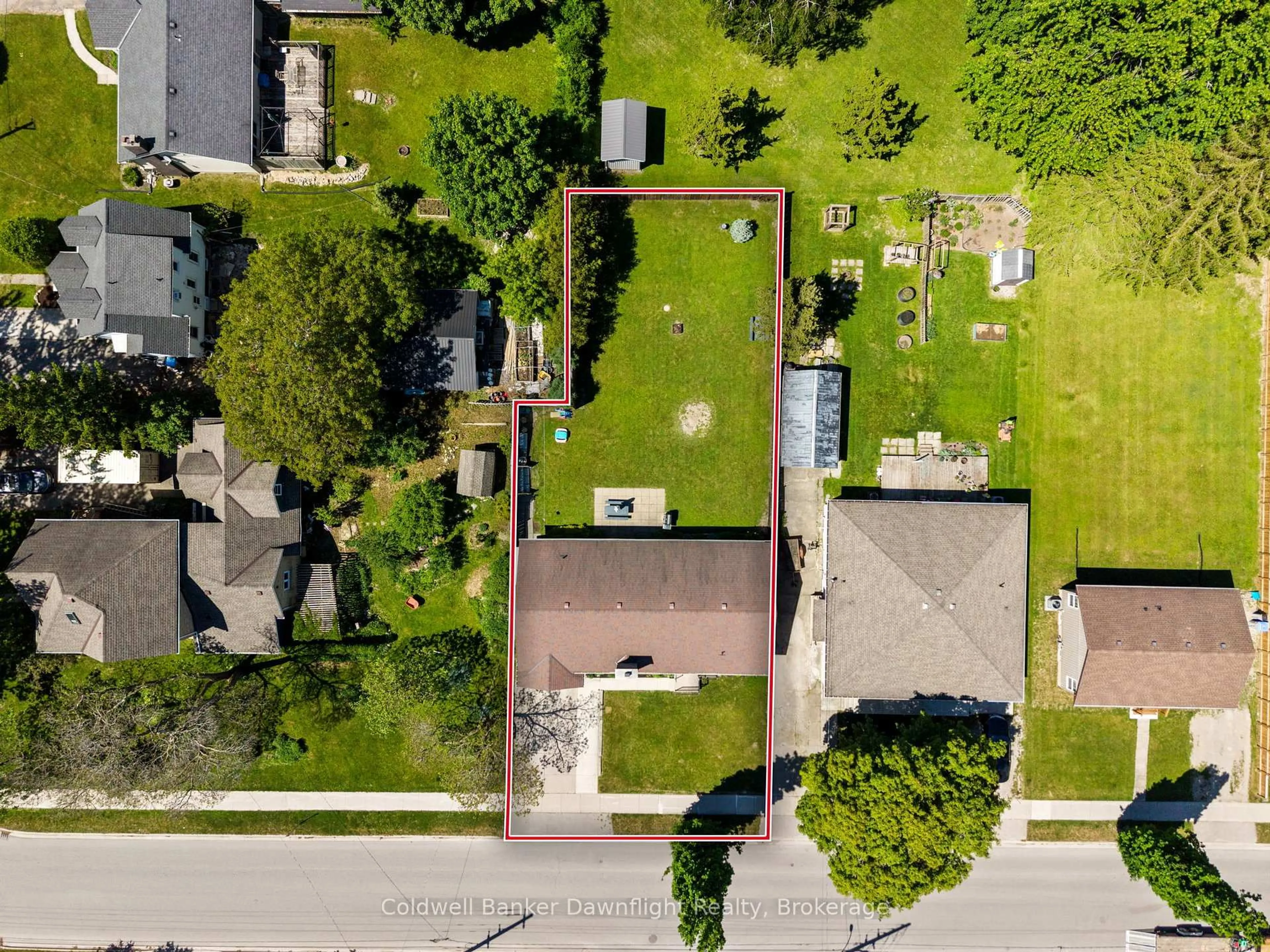 A pic from outside/outdoor area/front of a property/back of a property/a pic from drone, street for 116 Sanders St, South Huron Ontario N0M 1S1