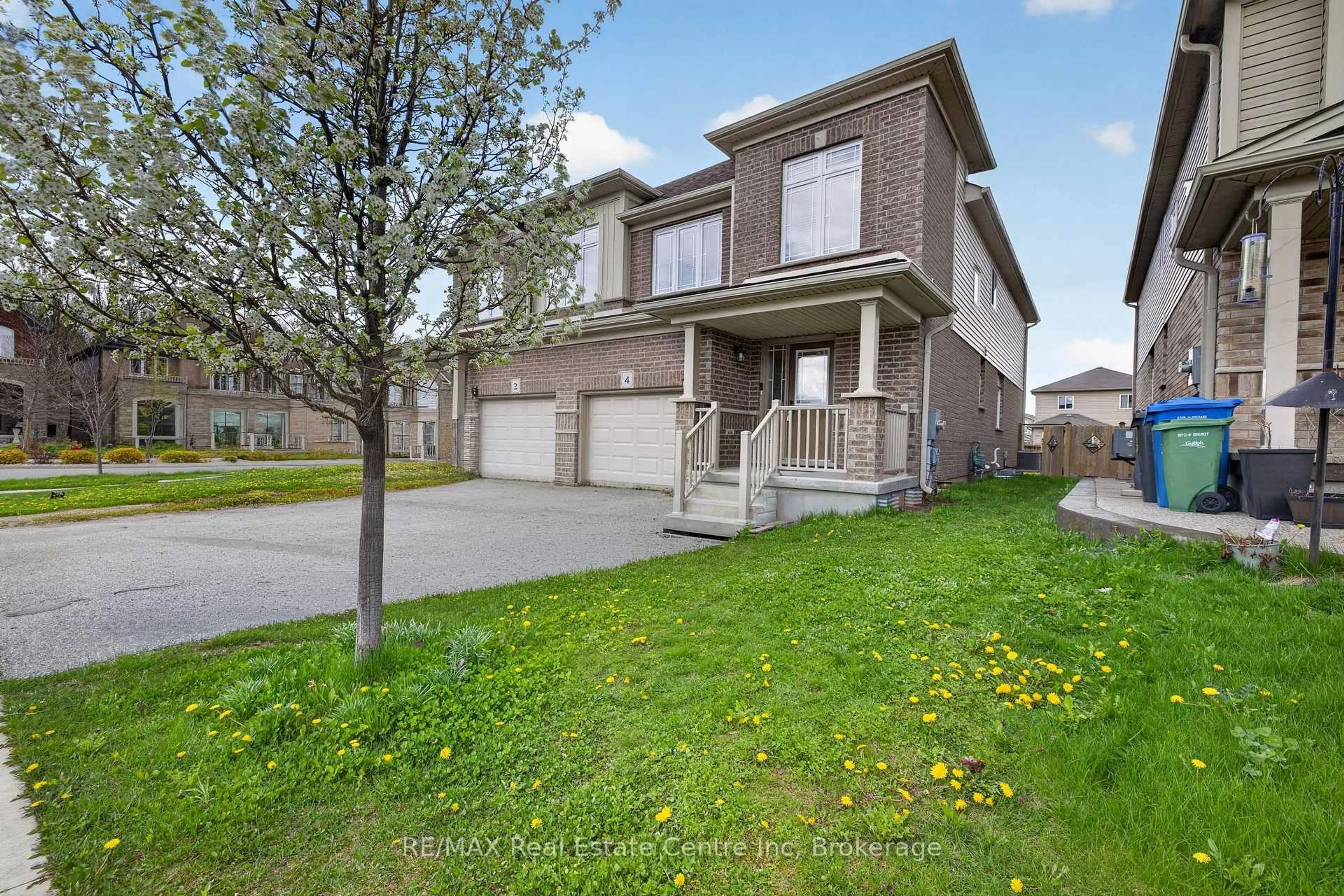 A pic from outside/outdoor area/front of a property/back of a property/a pic from drone, street for 4 Drone Cres, Guelph Ontario N1K 0C1