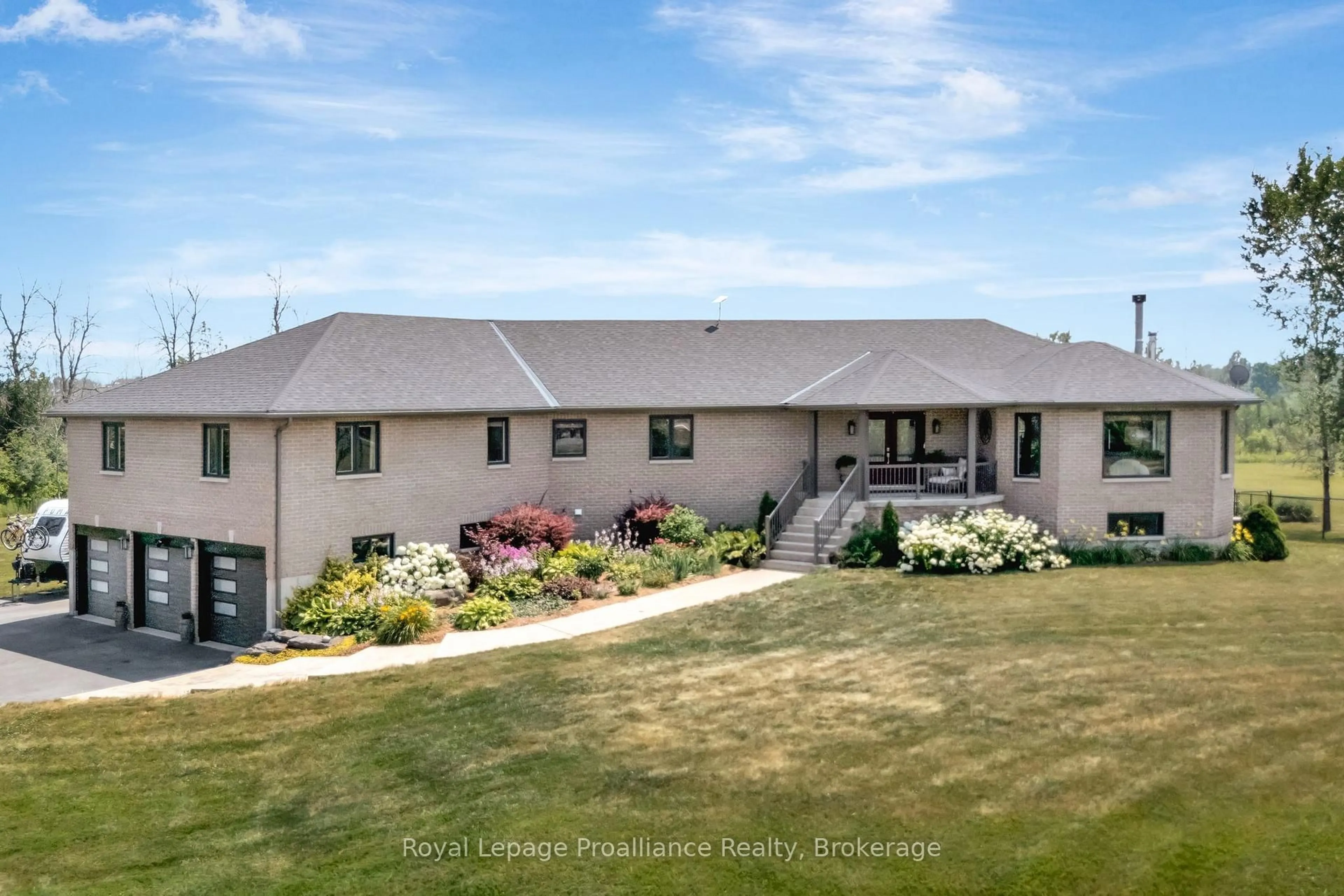 A pic from outside/outdoor area/front of a property/back of a property/a pic from drone, unknown for 6282 County Road 2, Bissett Creek Ontario K0H 2H0