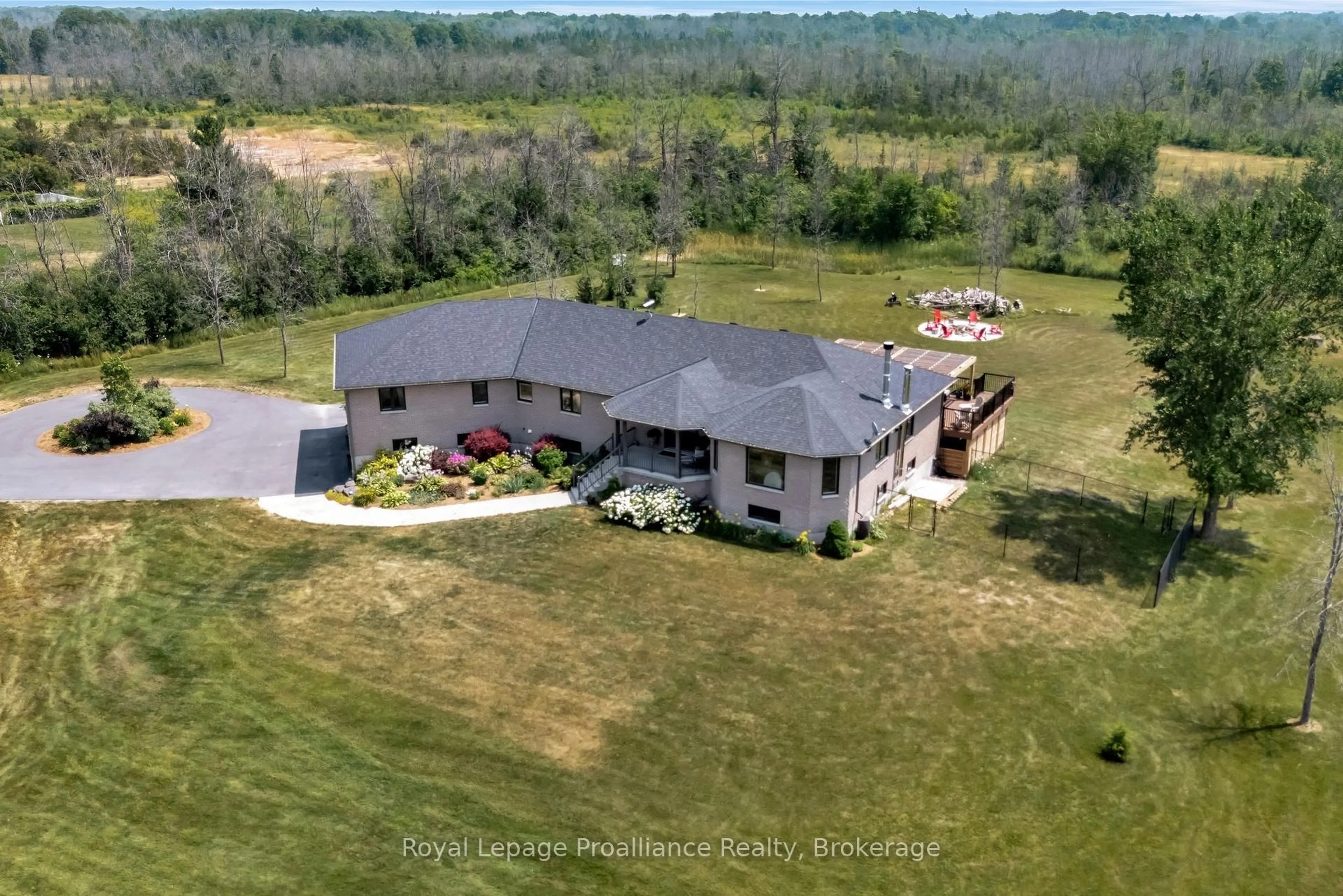 A pic from outside/outdoor area/front of a property/back of a property/a pic from drone, building for 6282 County Road 2, Bissett Creek Ontario K0H 2H0