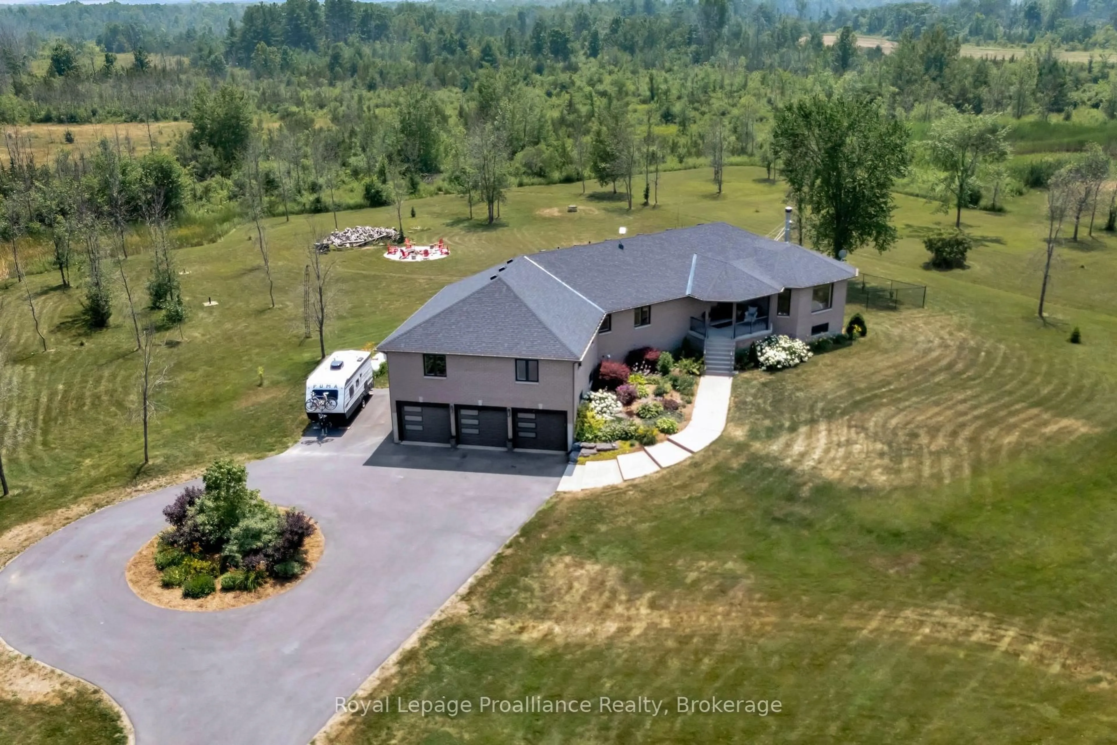 A pic from outside/outdoor area/front of a property/back of a property/a pic from drone, unknown for 6282 County Road 2, Bissett Creek Ontario K0H 2H0