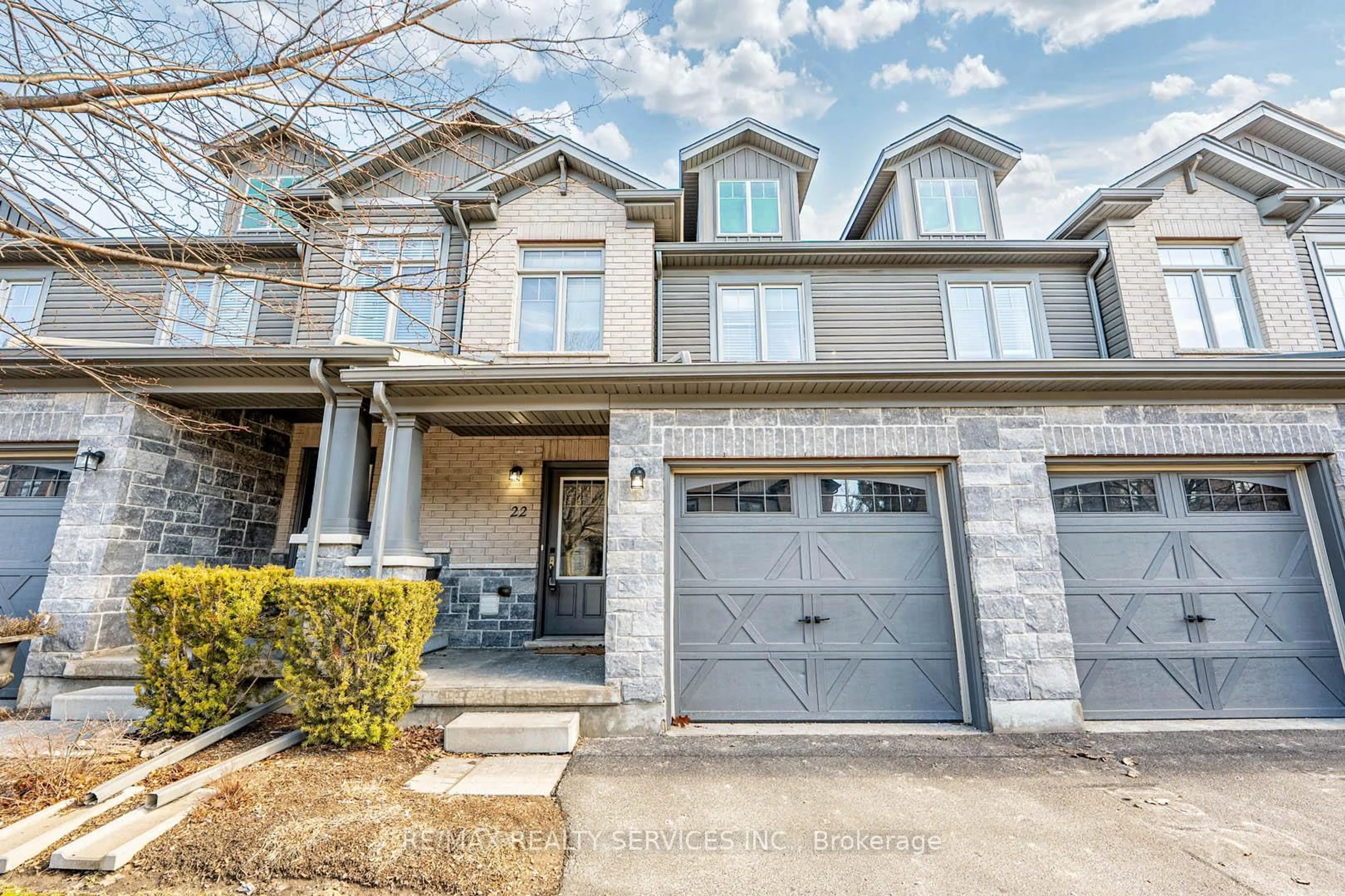 Home with brick exterior material, street for 22 Arlington Cres #22, Guelph Ontario N1L 0K9