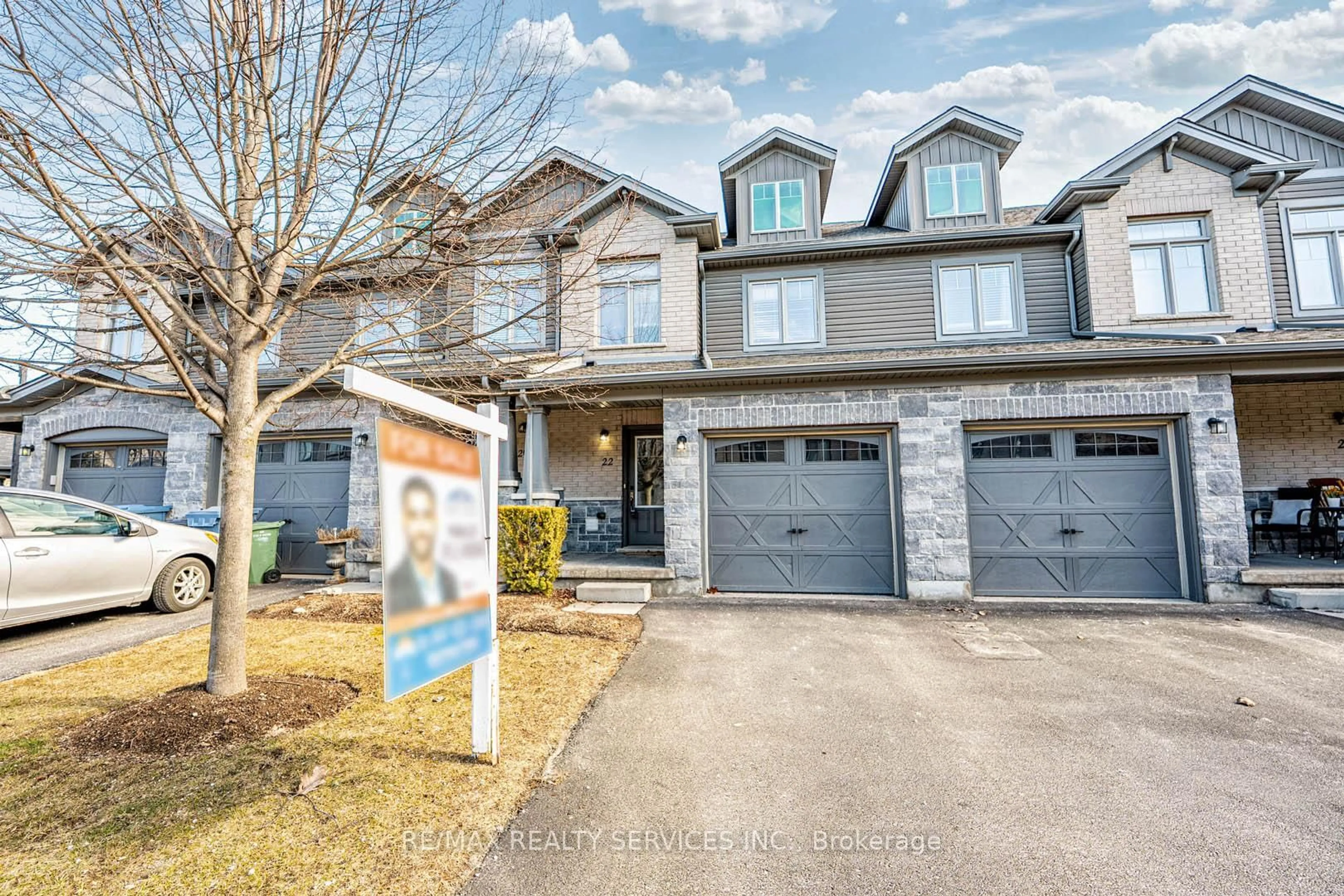 Home with brick exterior material, street for 22 Arlington Cres #22, Guelph Ontario N1L 0K9