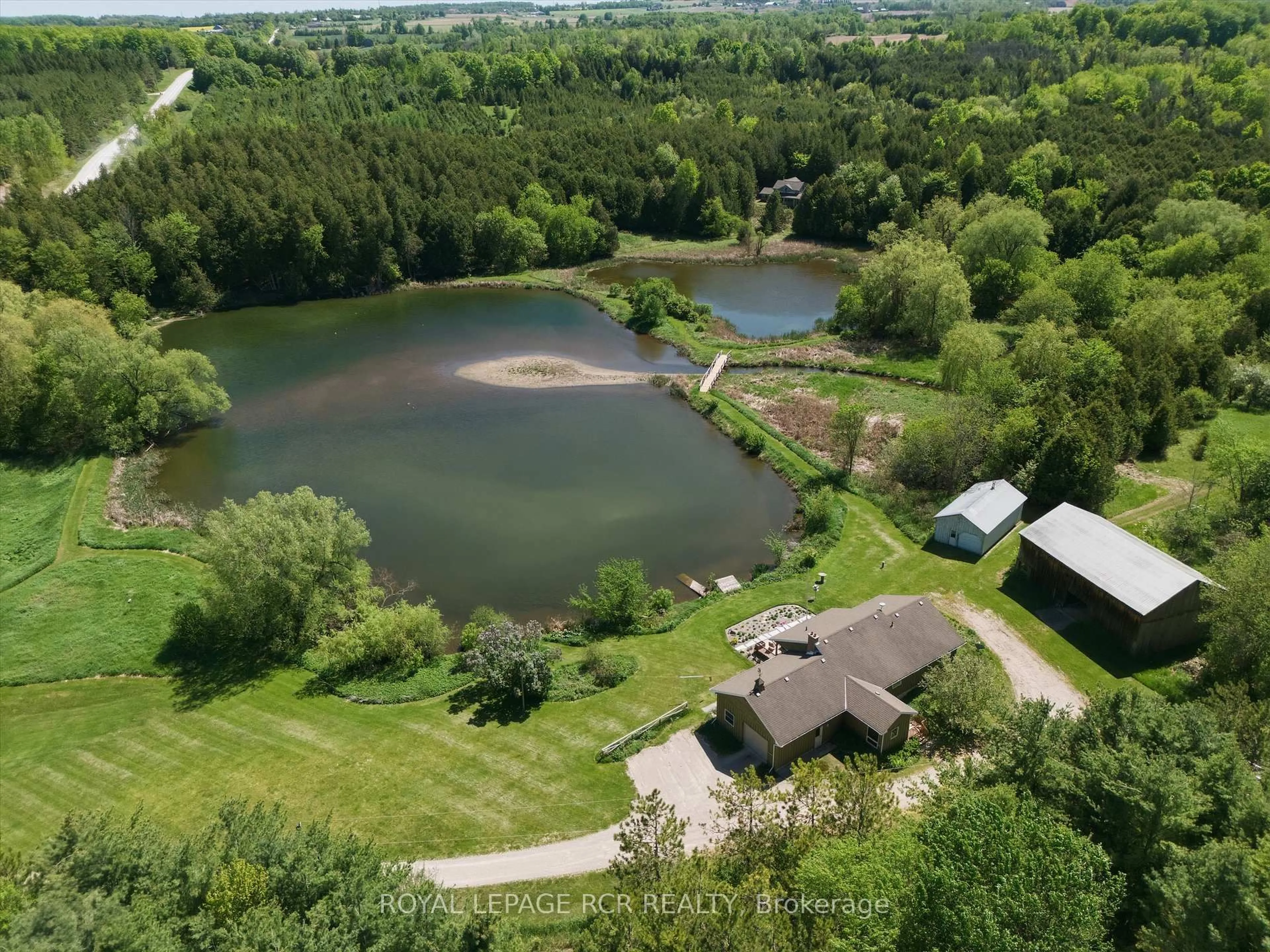 A pic from outside/outdoor area/front of a property/back of a property/a pic from drone, water/lake/river/ocean view for 996248 Mulmur-Tos Townline, Mulmur Ontario L9V 0N1
