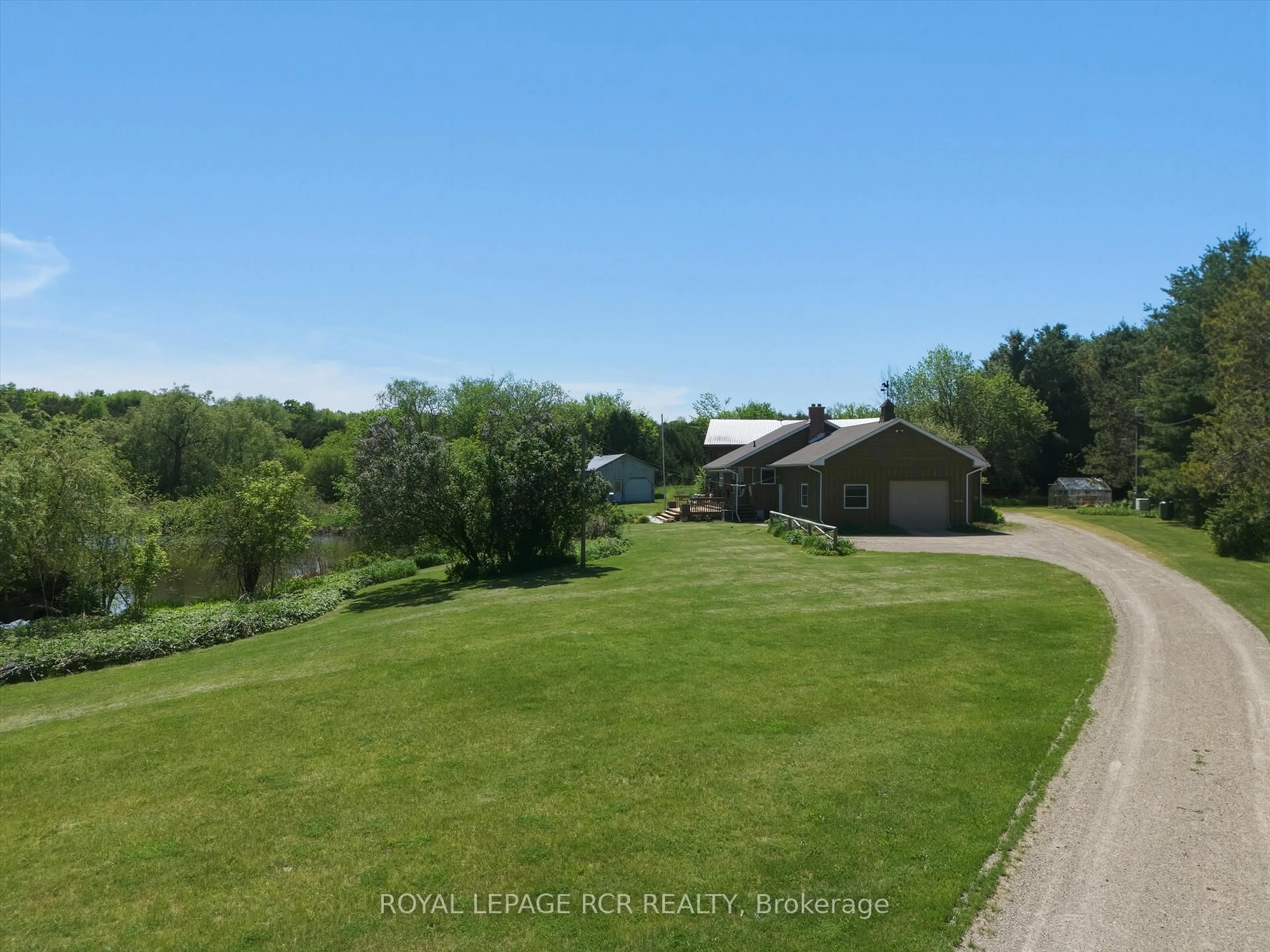 A pic from outside/outdoor area/front of a property/back of a property/a pic from drone, water/lake/river/ocean view for 996248 Mulmur-Tos Townline, Mulmur Ontario L9V 0N1