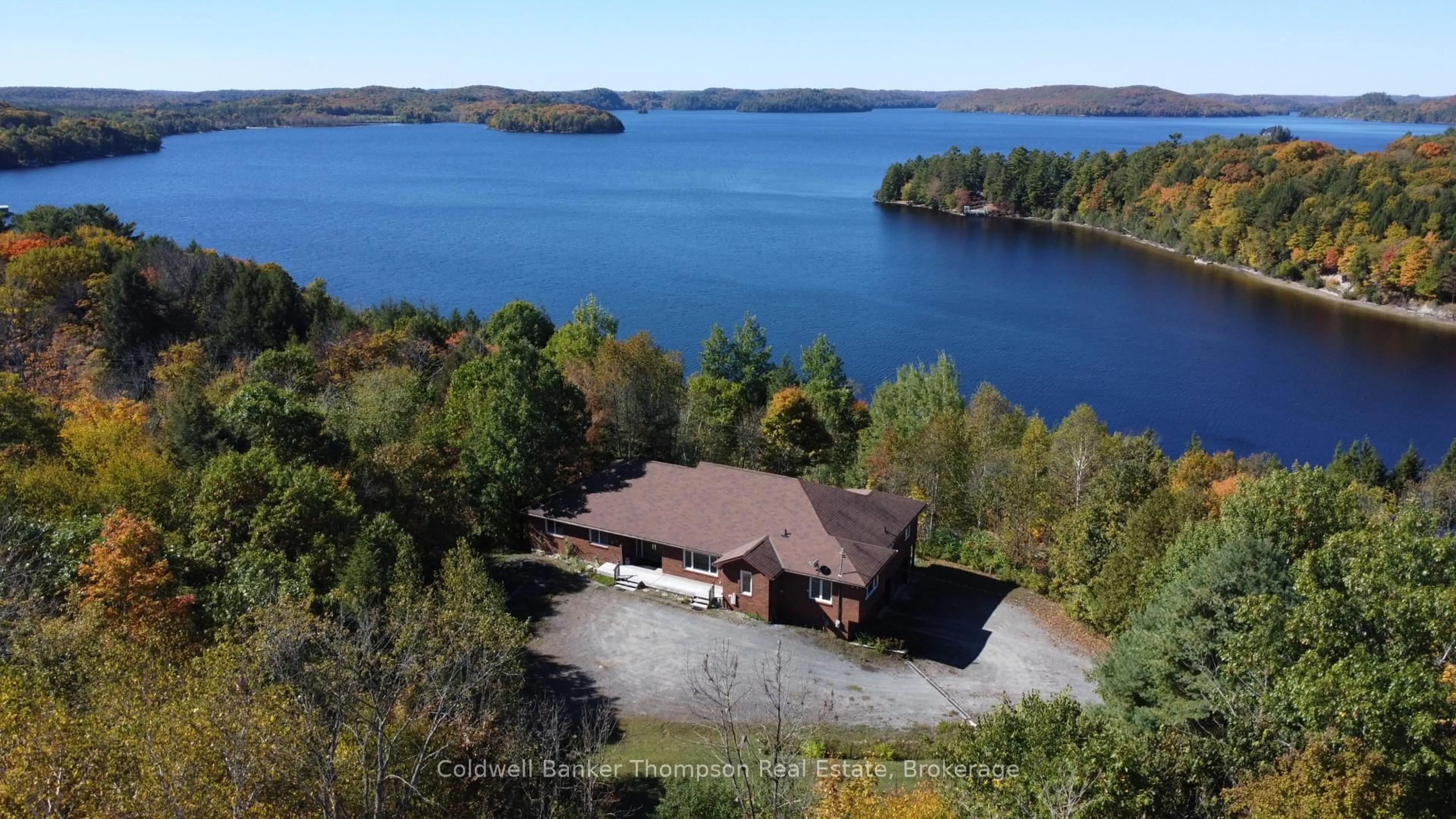 A pic from outside/outdoor area/front of a property/back of a property/a pic from drone, water/lake/river/ocean view for 625 Bayshore Blvd, Huntsville Ontario P1H 1Z1