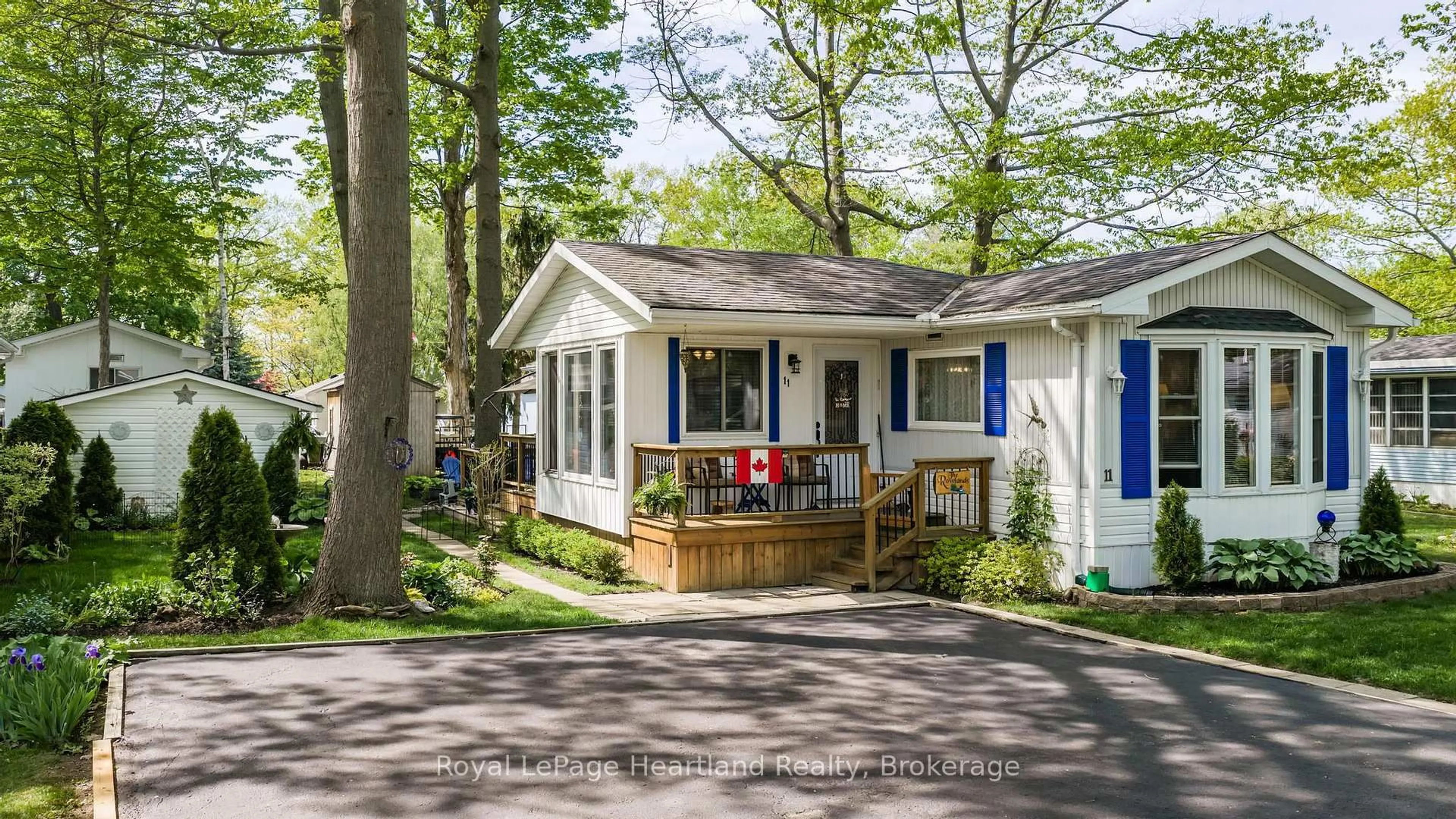 Home with vinyl exterior material, street for 11 Sioux Lane, Ashfield-Colborne-Wawanosh Ontario N7A 3Y2