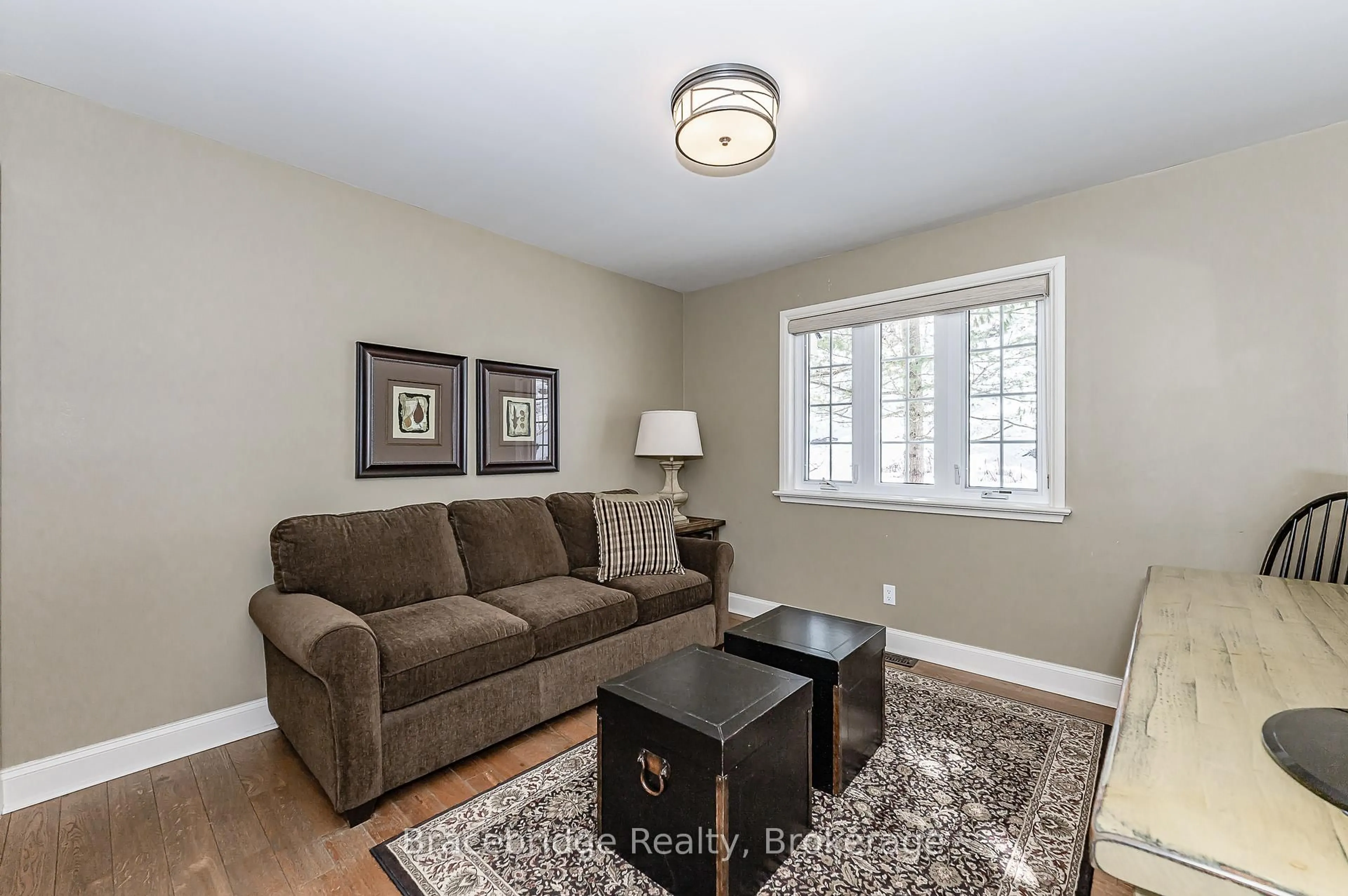 Living room with furniture, unknown for 3876 Muskoka Rd 118 Highway #Sandfield 3 W3, Muskoka Lakes Ontario P0B 1J0