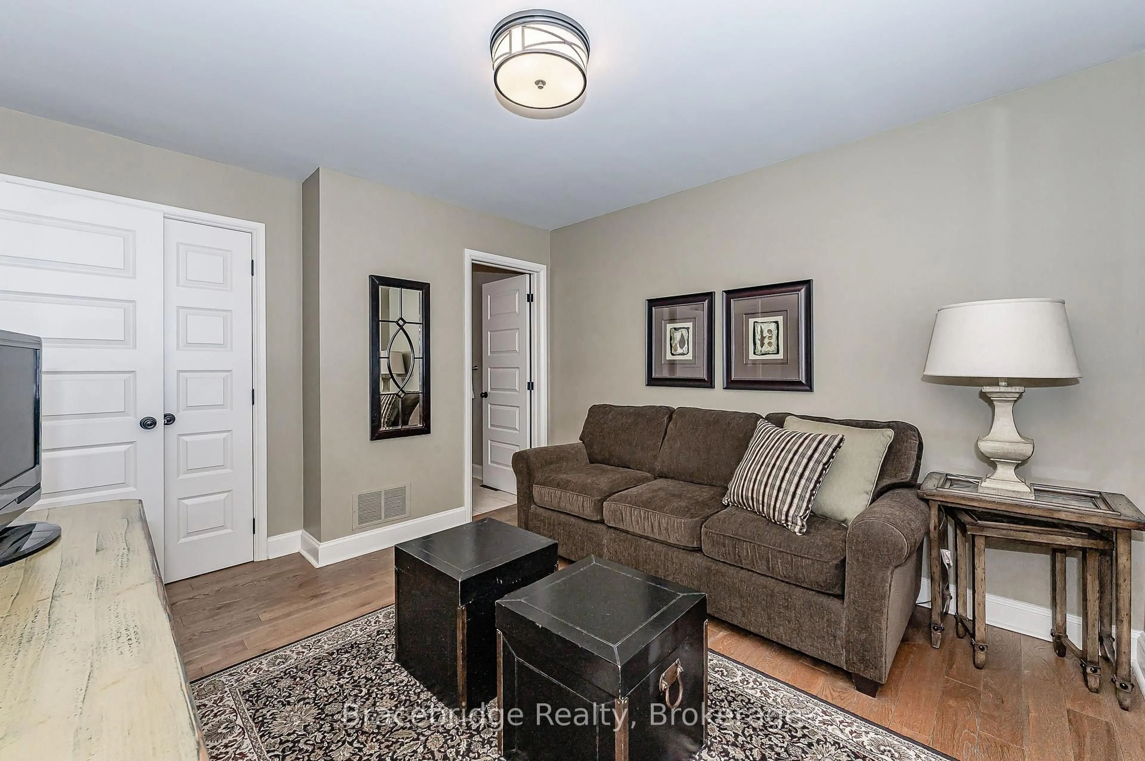 Living room with furniture, unknown for 3876 Muskoka Rd 118 Highway #Sandfield 3 W3, Muskoka Lakes Ontario P0B 1J0