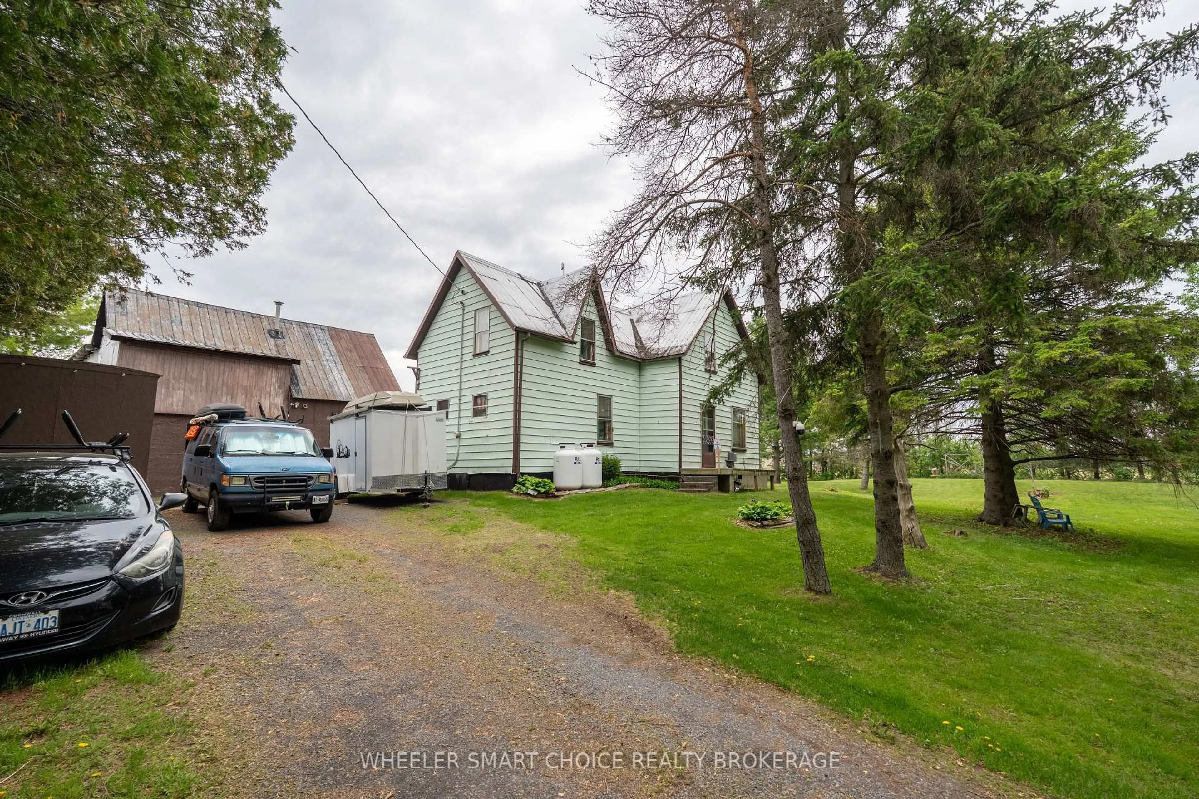 A pic from outside/outdoor area/front of a property/back of a property/a pic from drone, street for 3645 May Rd, South Stormont Ontario K0C 1Y0