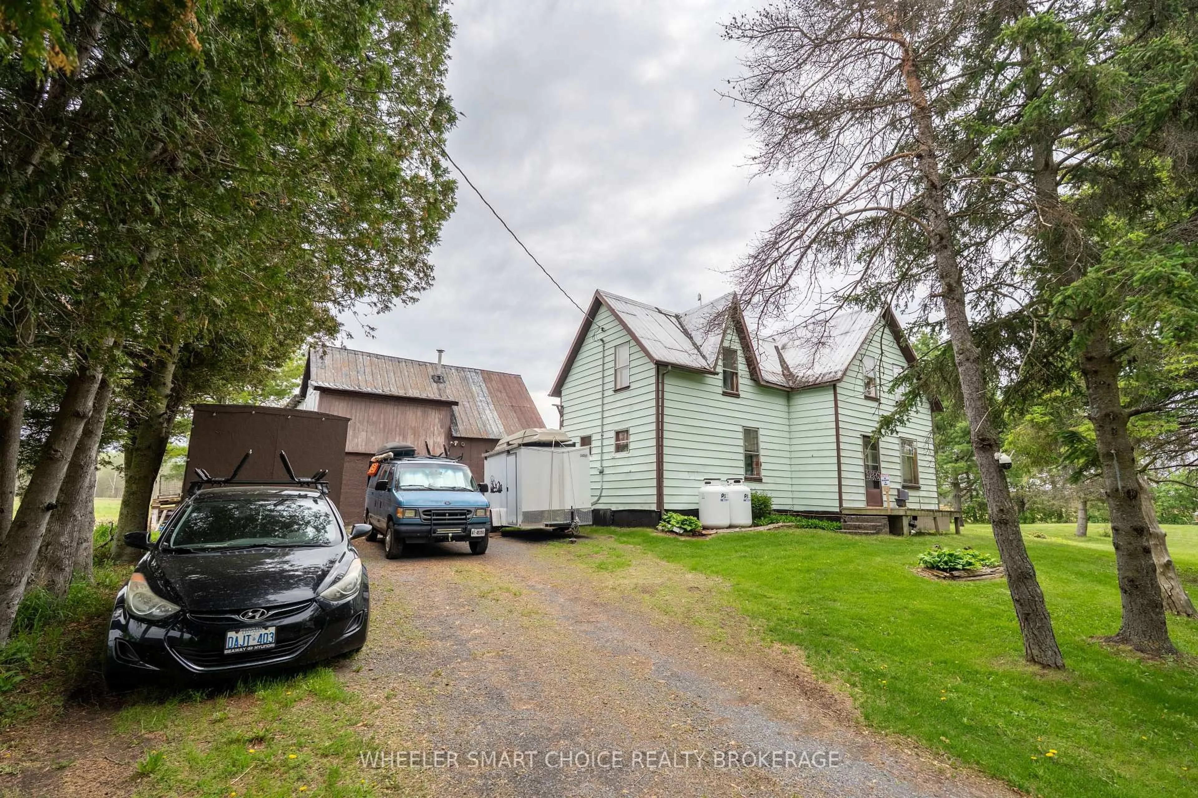 A pic from outside/outdoor area/front of a property/back of a property/a pic from drone, street for 3645 May Rd, South Stormont Ontario K0C 1Y0